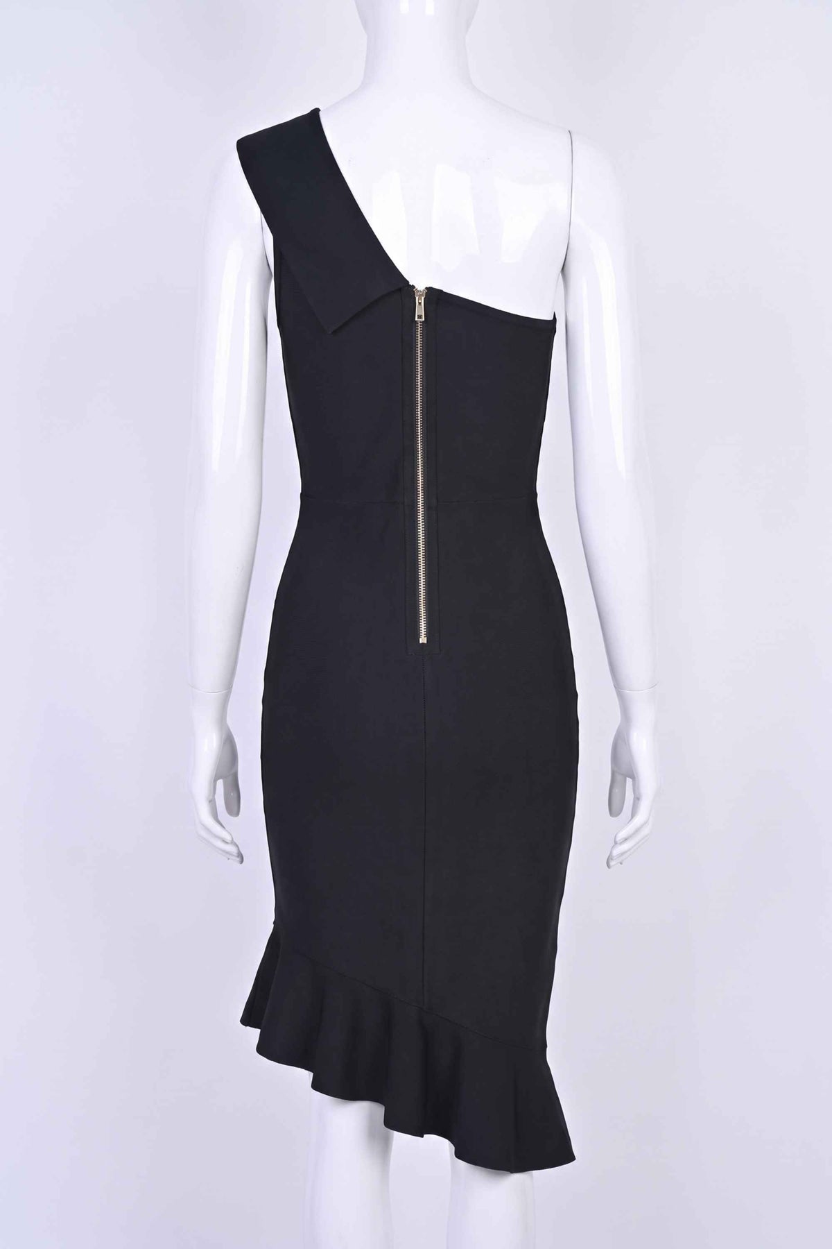 Woman wearing a figure flattering  Avery Bandage Dress - Classic Black BODYCON COLLECTION