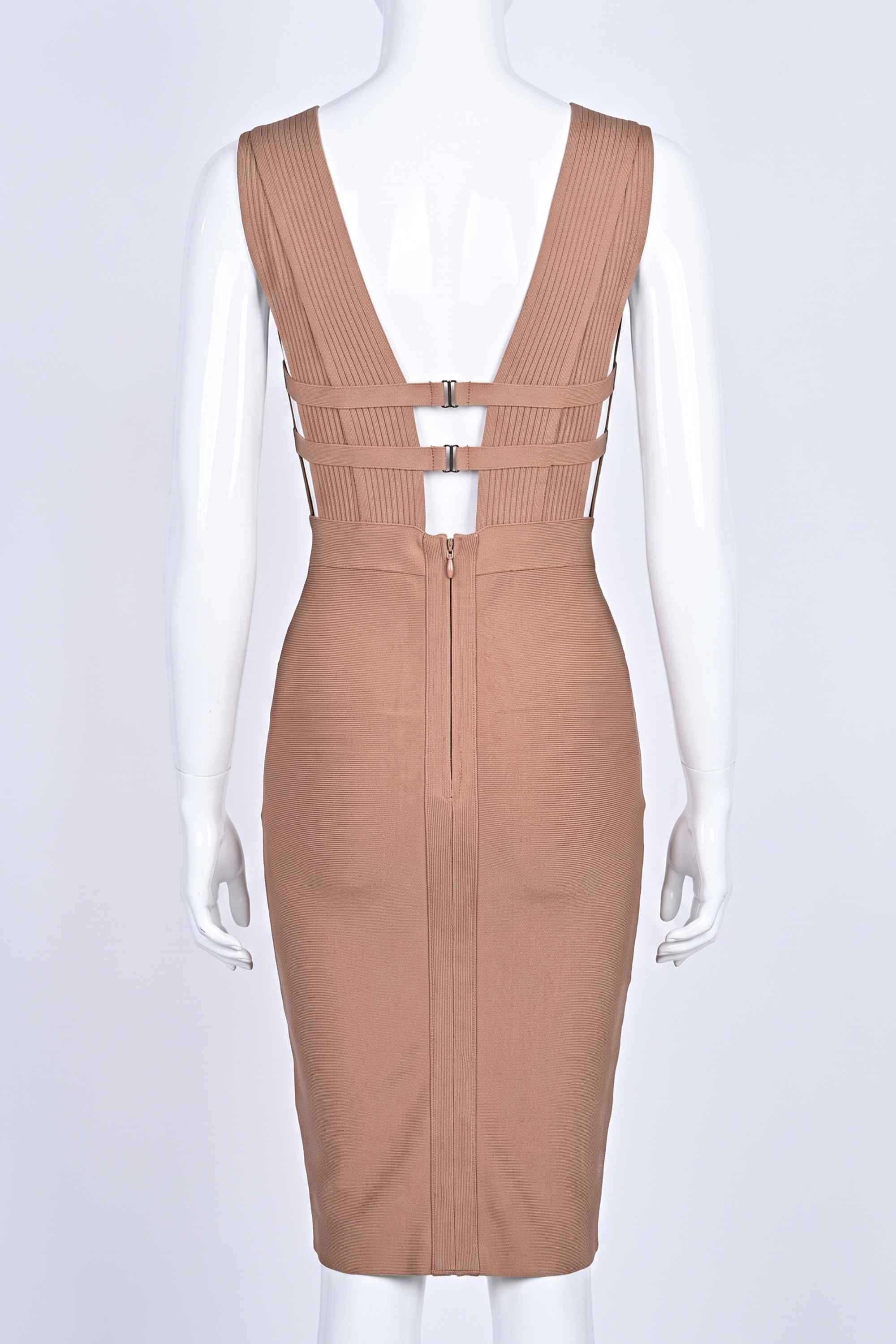 Woman wearing a figure flattering  Bay Bandage Dress - Nude Bodycon Collection