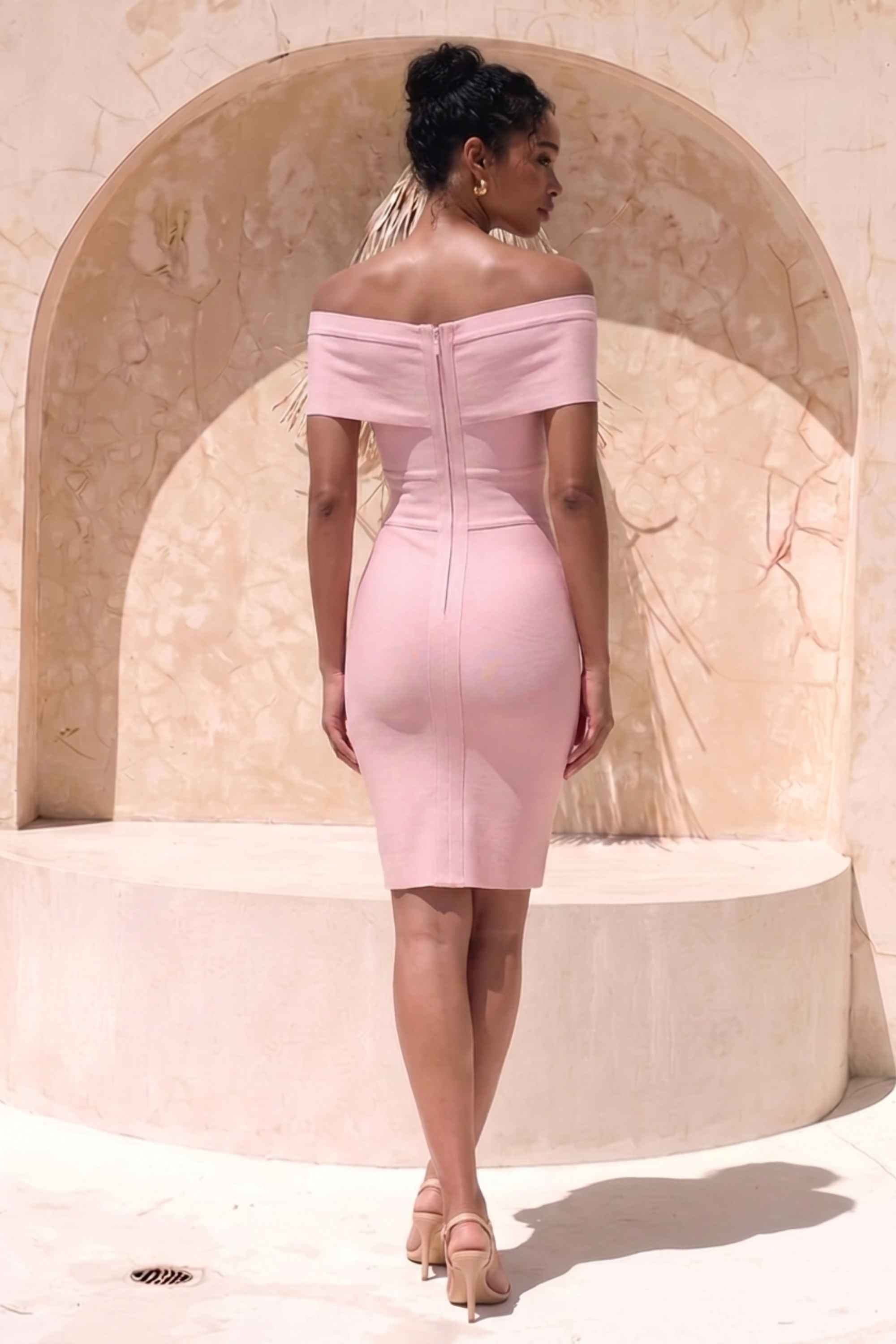 Woman wearing a figure flattering  Bea Bandage Dress - Cream Bodycon Collection