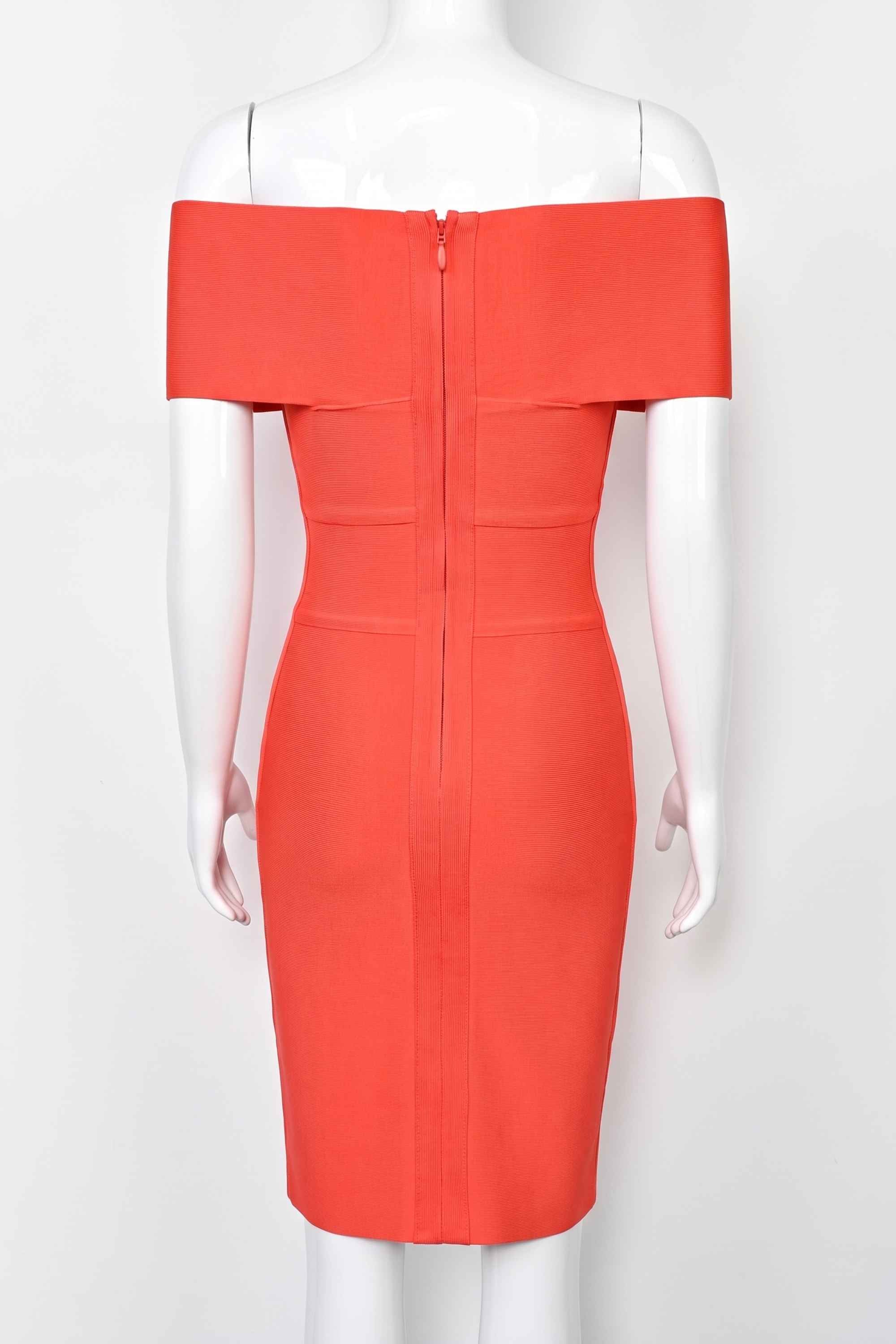 Woman wearing a figure flattering  Bea Bandage Dress - Lipstick Red Bodycon Collection