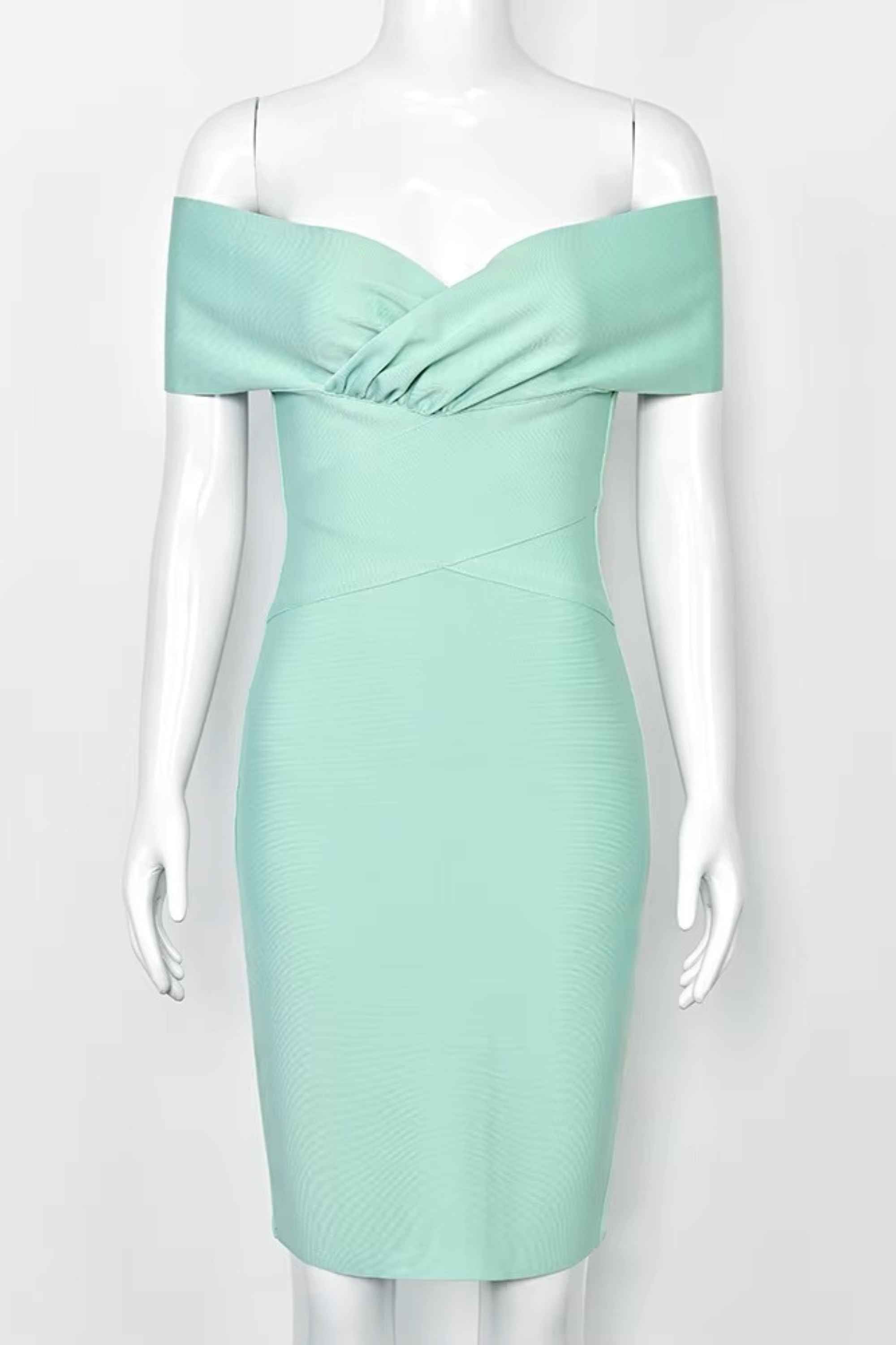 Woman wearing a figure flattering  Bea Bandage Dress - Mint Green Bodycon Collection