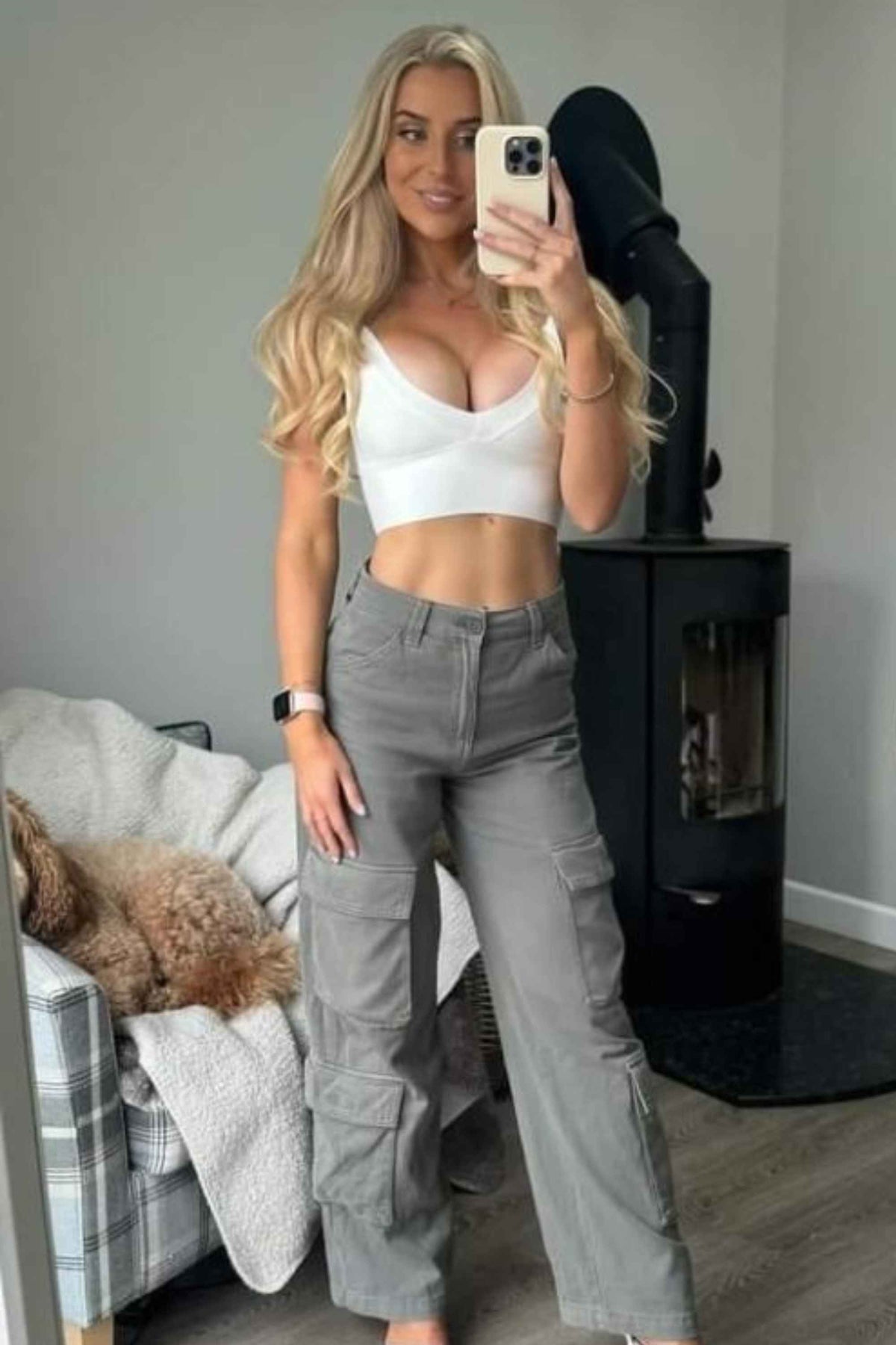 Woman wearing a figure flattering  Bee Bandage Crop Top - Pearl White BODYCON COLLECTION