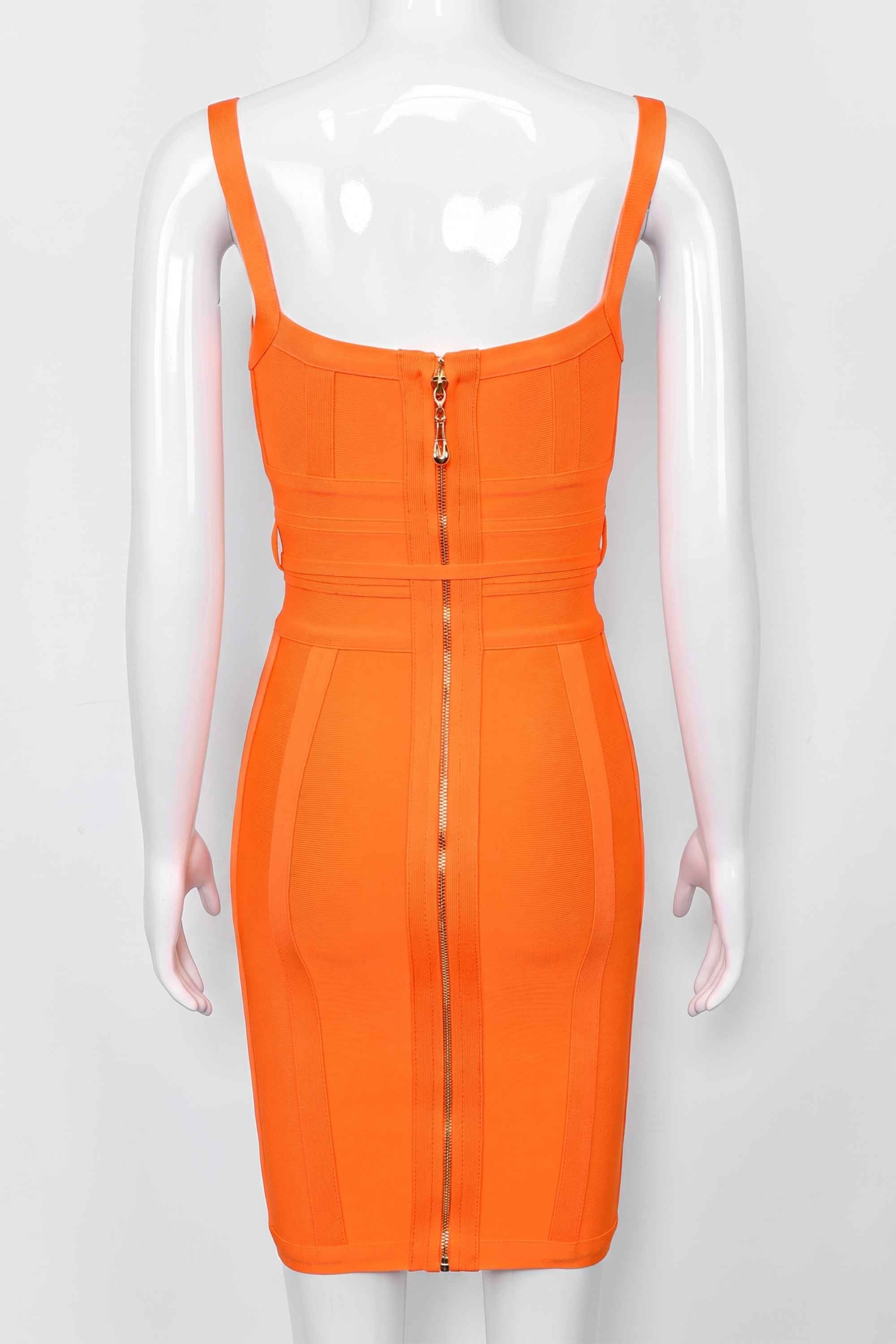 Woman wearing a figure flattering  Bek Bandage Dress - Apricot Orange Bodycon Collection