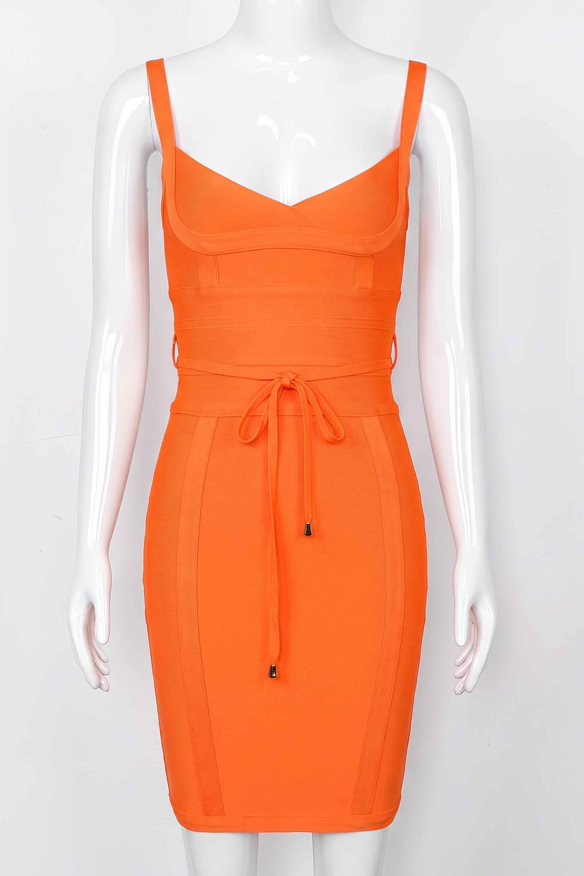 Woman wearing a figure flattering  Bek Bandage Dress - Apricot Orange Bodycon Collection