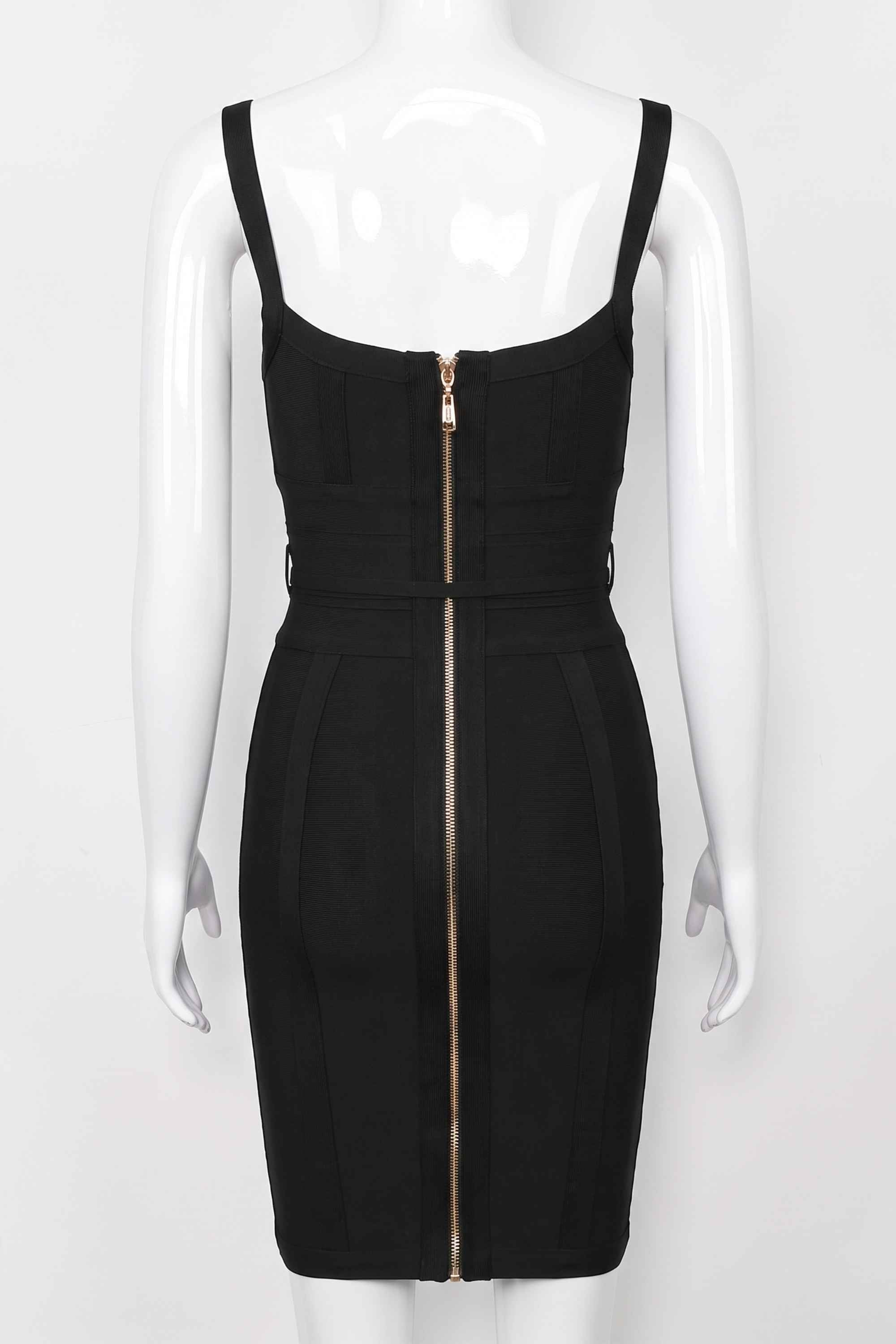 Woman wearing a figure flattering  Bek Bandage Dress - Classic Black Bodycon Collection