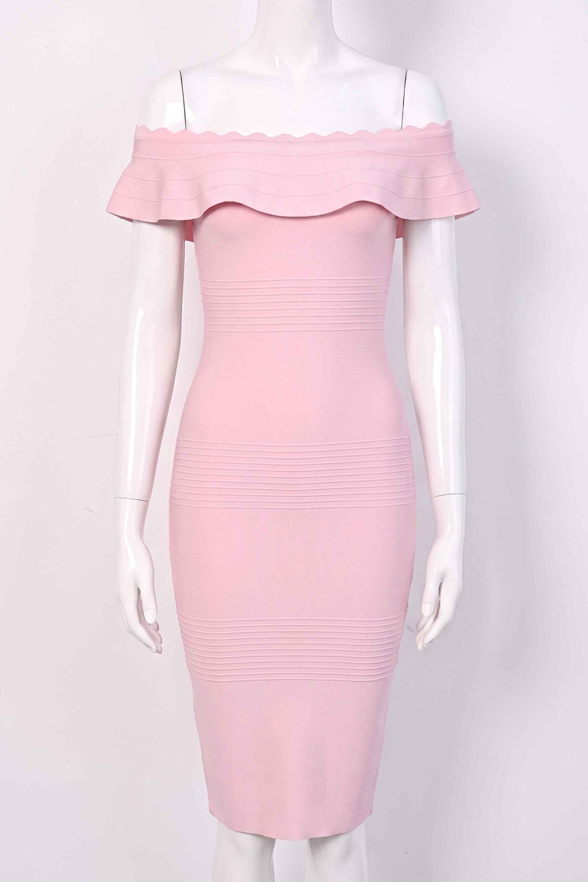 Woman wearing a figure flattering  Billie Bandage Midi Dress - Dusty Pink Bodycon Collection