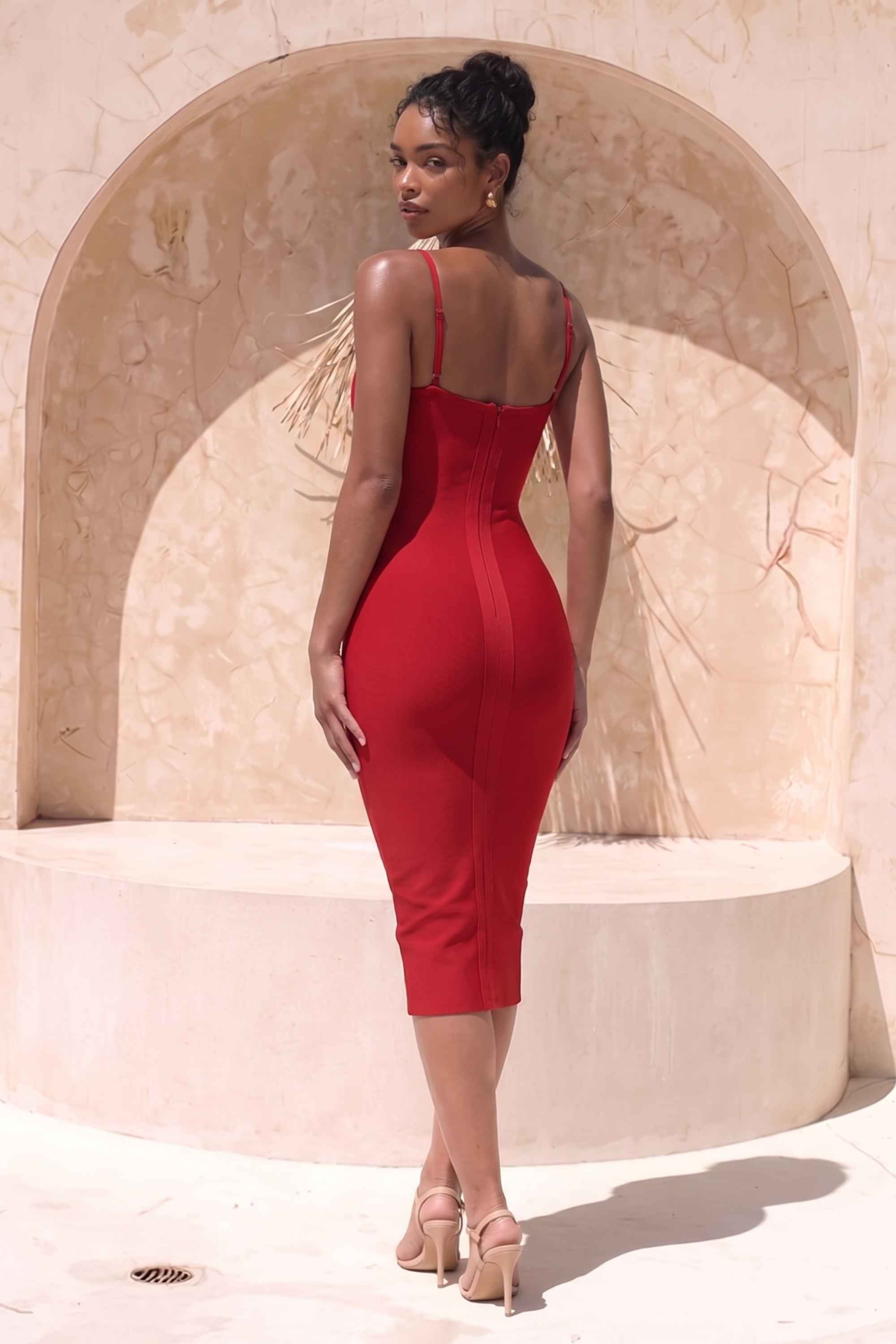 Woman wearing a figure flattering  Blanche Bandage Midi Dress - Lipstick Red BODYCON COLLECTION