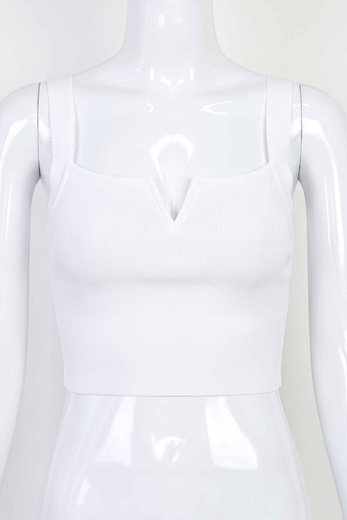 Woman wearing a figure flattering  Brooke Bandage Crop Top - Pearl White BODYCON COLLECTION