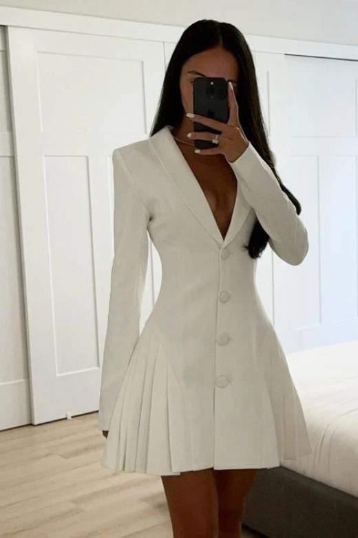 Woman wearing a figure flattering  Candi Long Sleeve Bodycon Mini Dress - Pearl White BODYCON COLLECTION