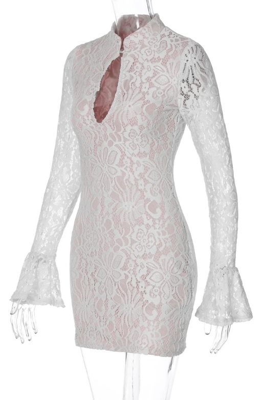 Woman wearing a figure flattering  Charlotte Long Sleeve Bodycon Mini Dress - White Pearl BODYCON COLLECTION