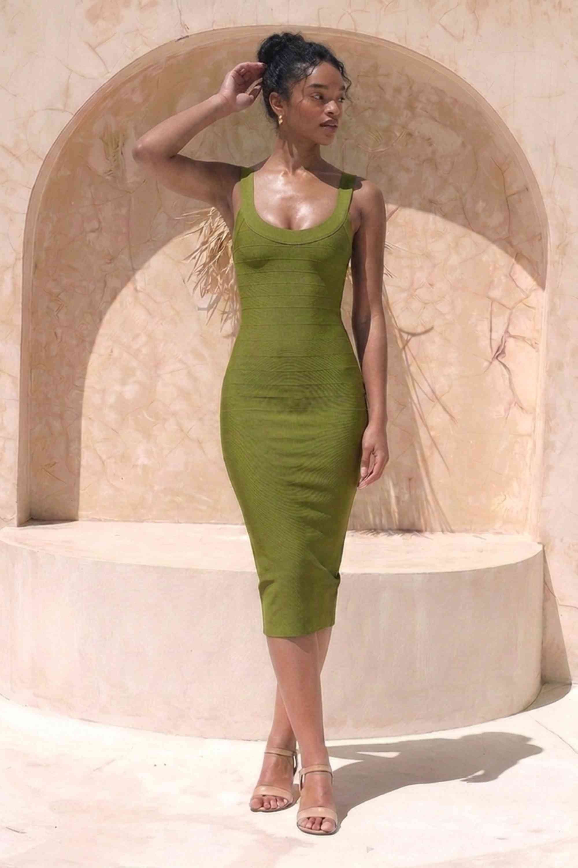 Woman wearing a figure flattering  Cindy Bandage Midi Dress - Army Green BODYCON COLLECTION Pty Ltd