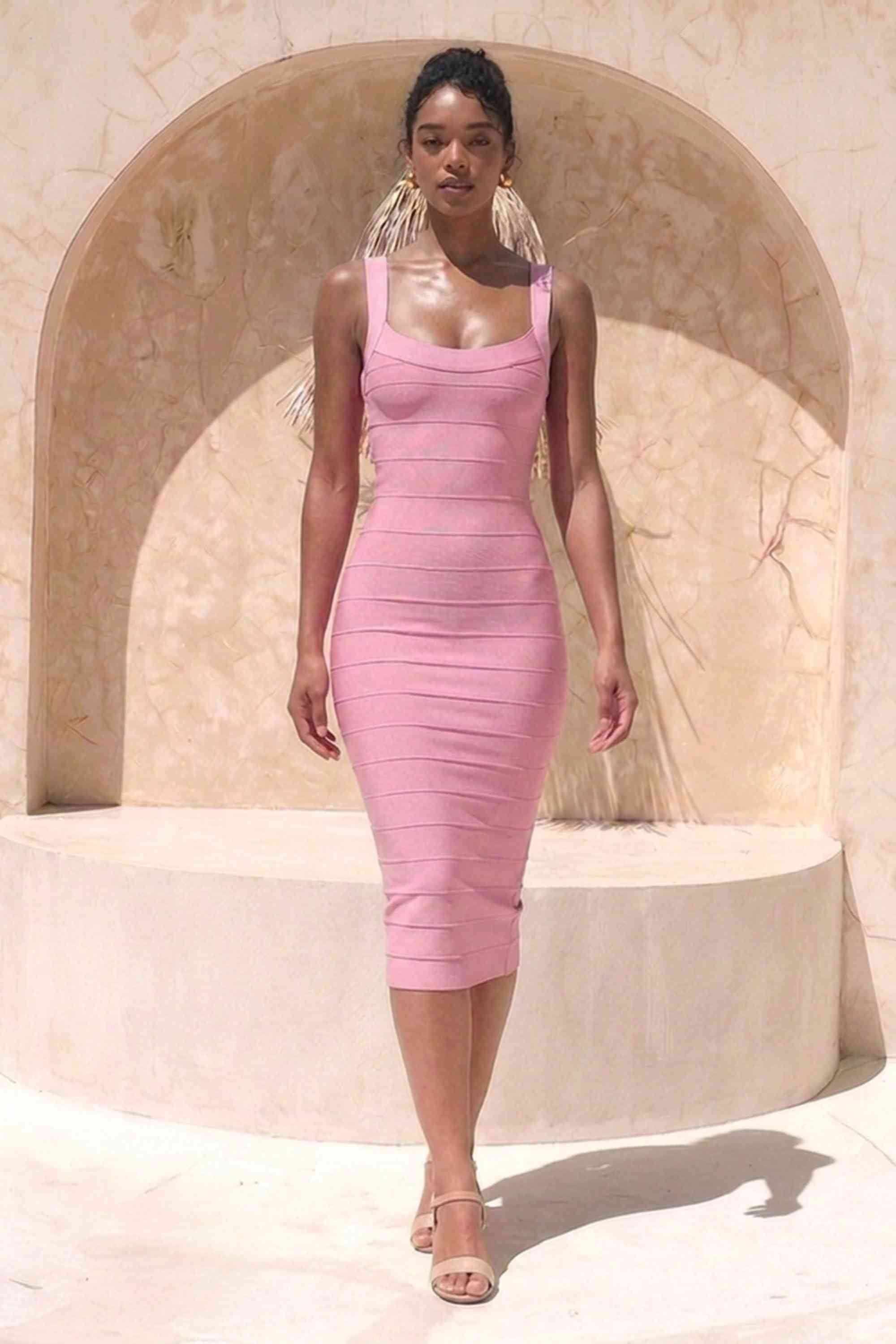 Woman wearing a figure flattering  Cindy Bandage Midi Dress - Blush Pink BODYCON COLLECTION Pty Ltd