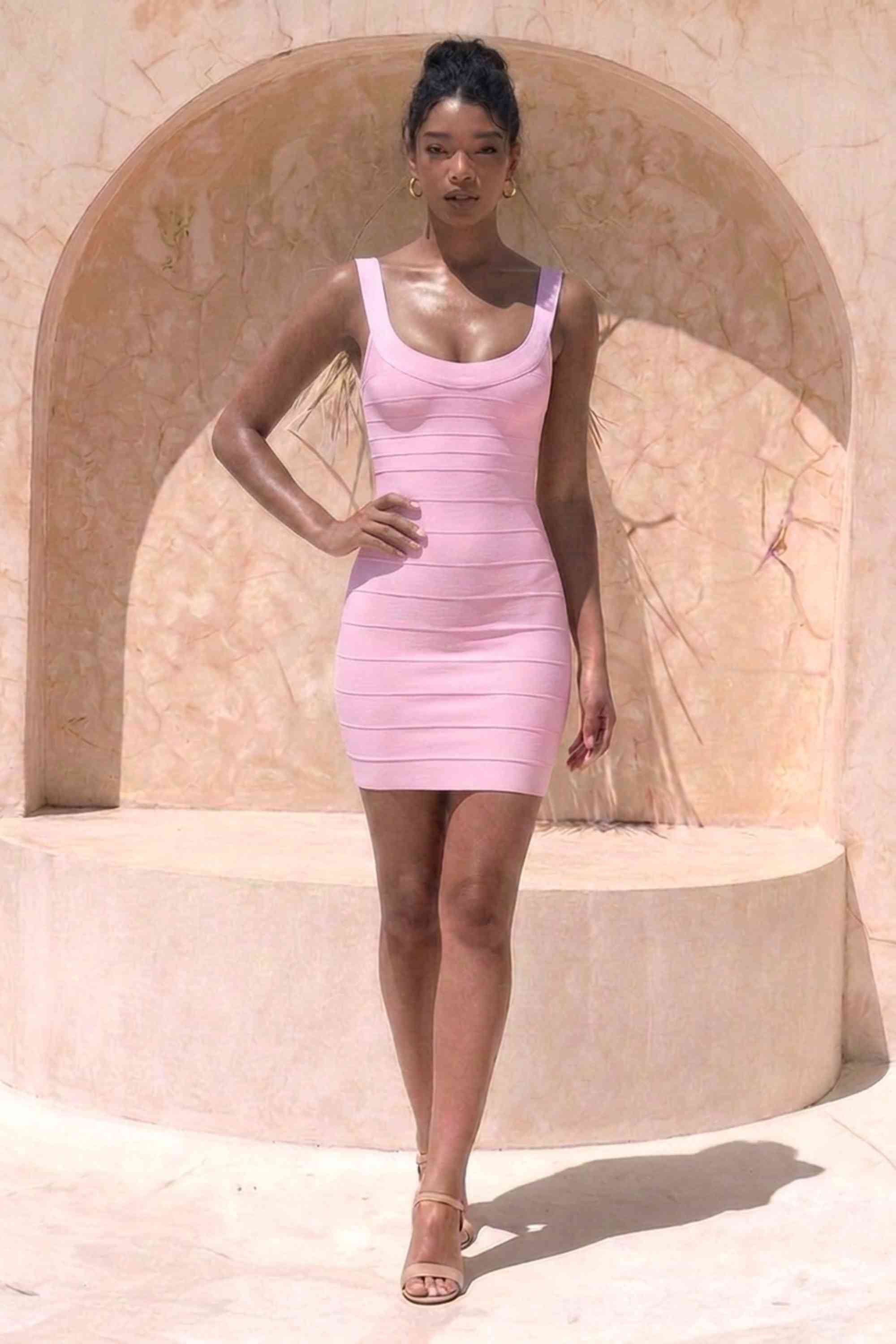 Woman wearing a figure flattering  Cindy Bandage Mini Dress - Dusty Pink BODYCON COLLECTION Pty Ltd