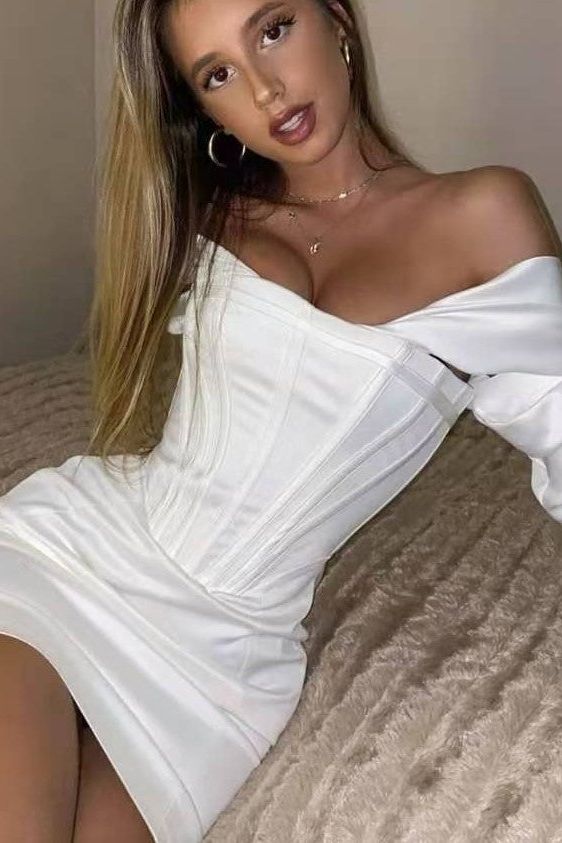 Woman wearing a figure flattering  Cosmo Long Sleeve Bodycon Mini Dress - Pearl White BODYCON COLLECTION