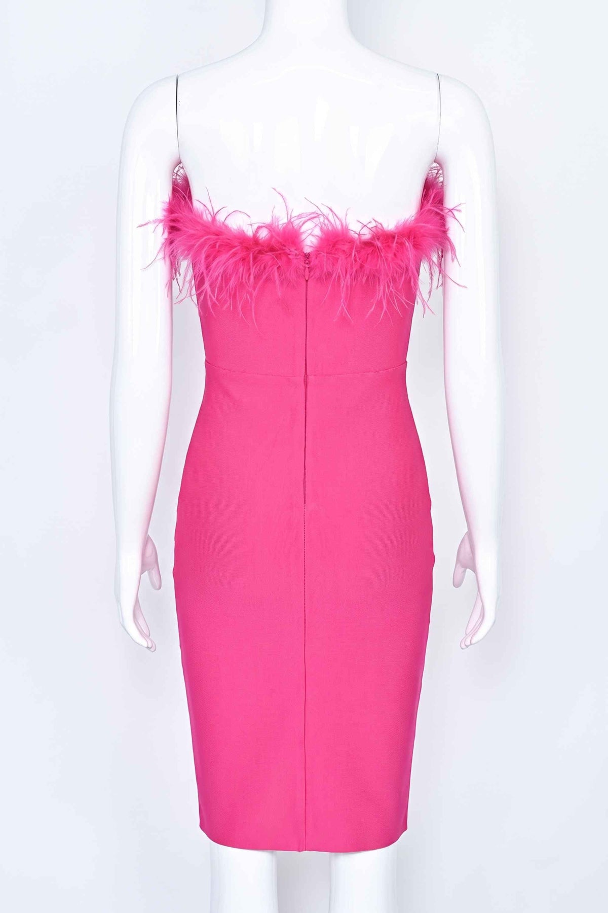 Woman wearing a figure flattering  Erin Bandage Dress - Hot Pink BODYCON COLLECTION