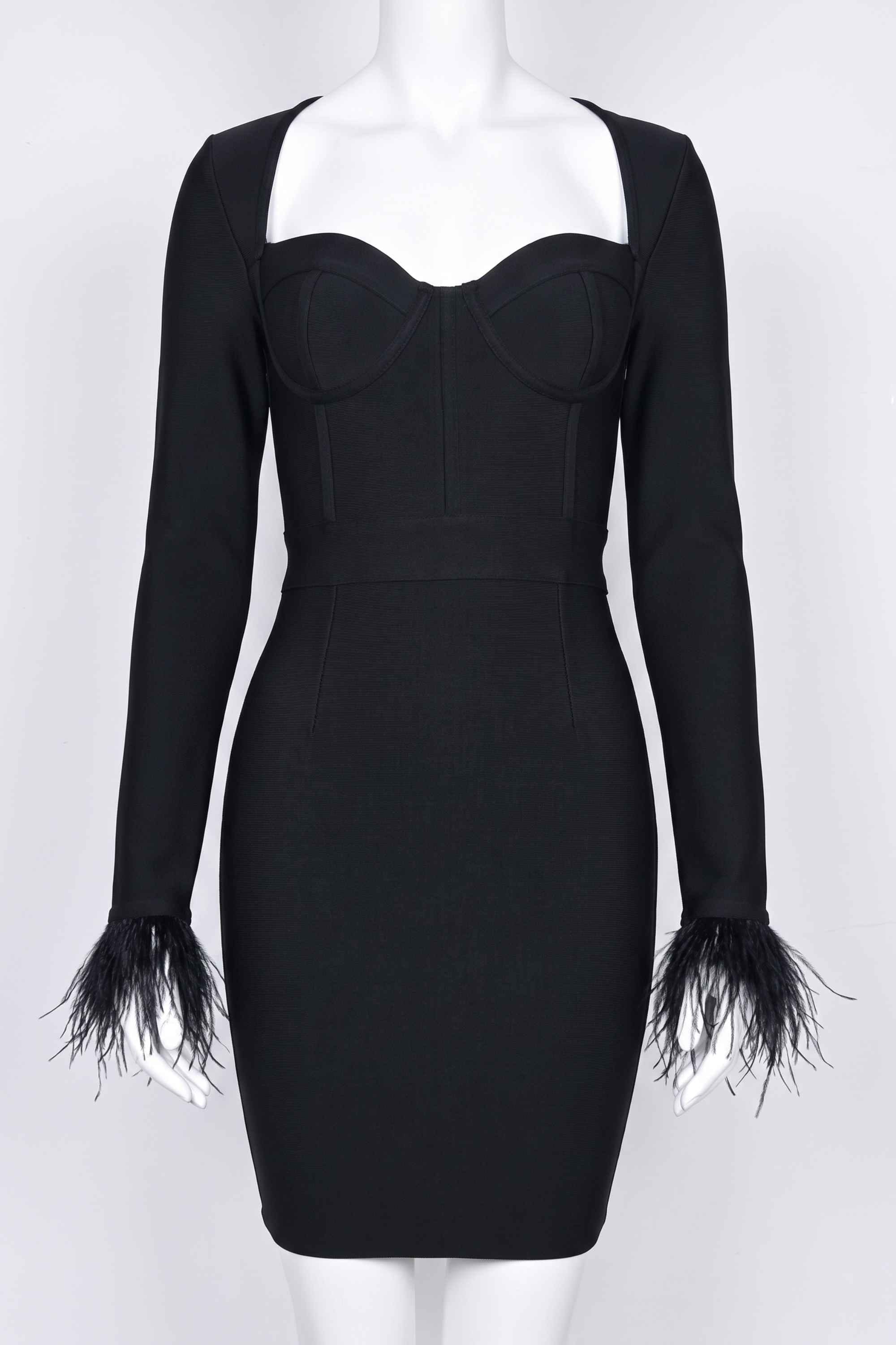 Woman wearing a figure flattering  Erin Long Sleeve Bandage Mini Dress - Classic Black BODYCON COLLECTION