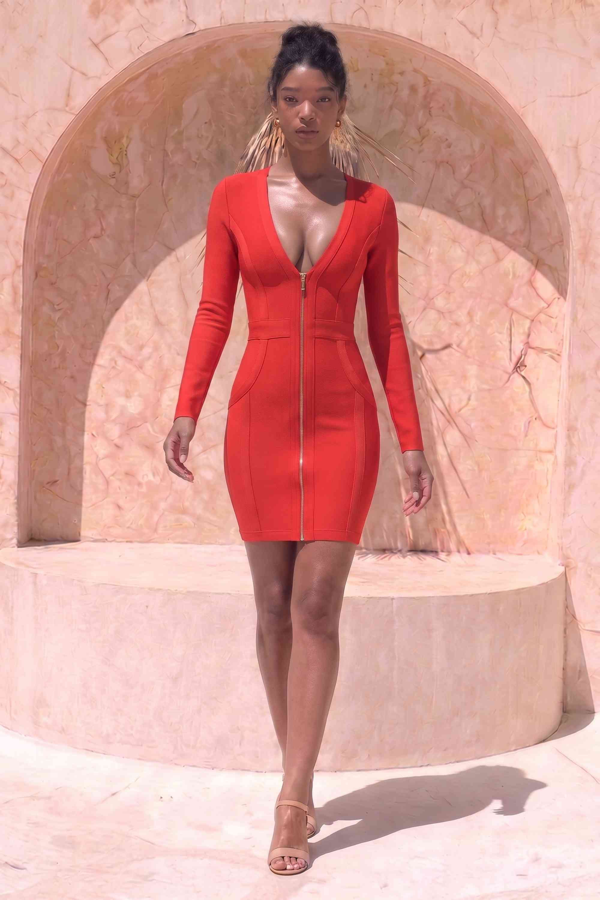 Woman wearing a figure flattering  Eva Long Sleeve Bandage Mini Dress - Lipstick Red BODYCON COLLECTION