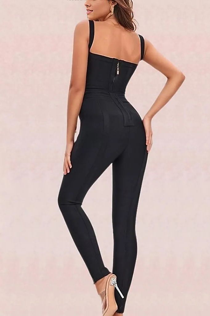 Woman wearing a figure flattering  Eve Bandage Pants Jumpsuit - Classic Black Bodycon Collection