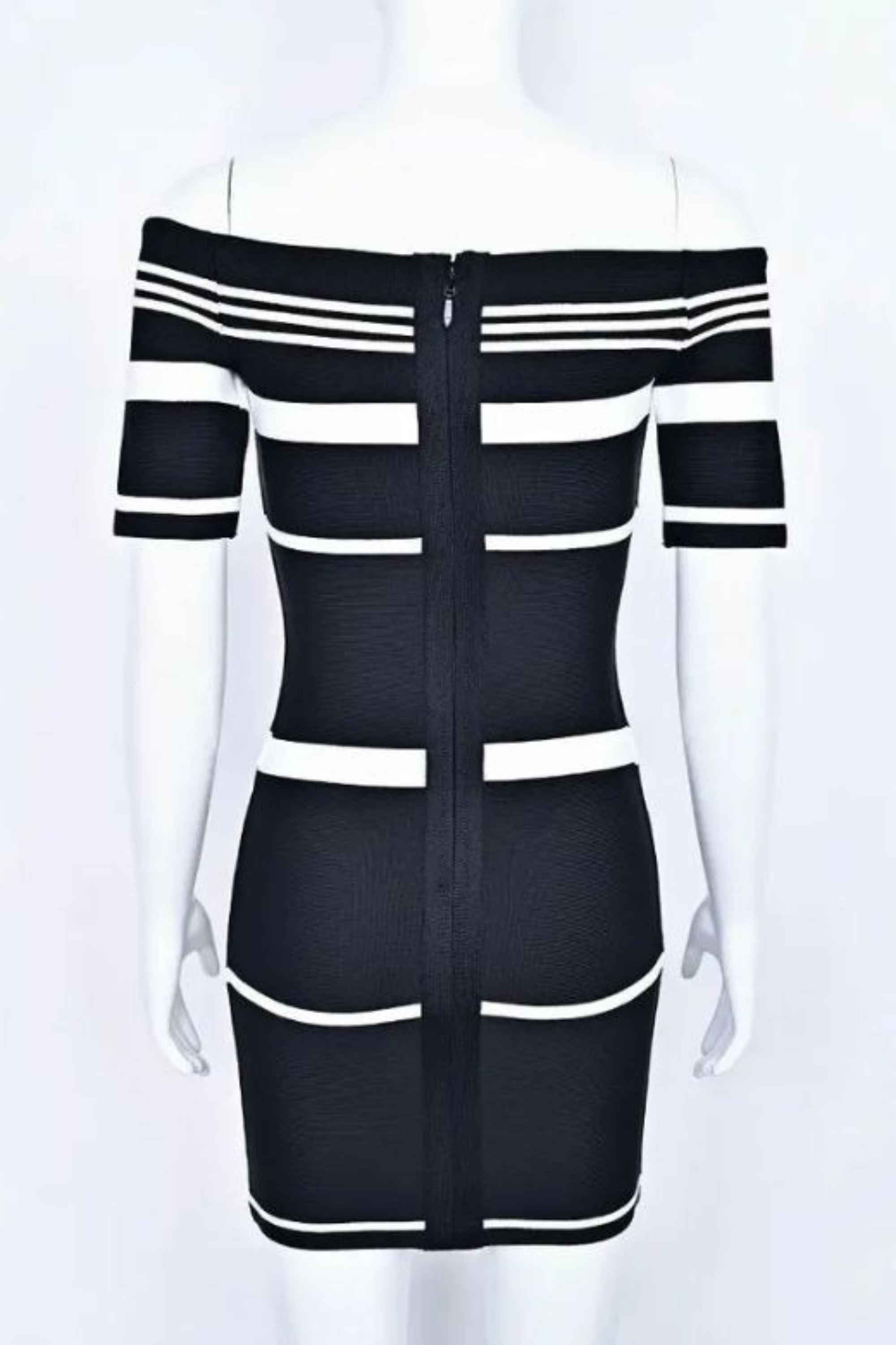 Woman wearing a figure flattering  Evelyn Bandage Mini Dress - Classic Black BODYCON COLLECTION Pty Ltd