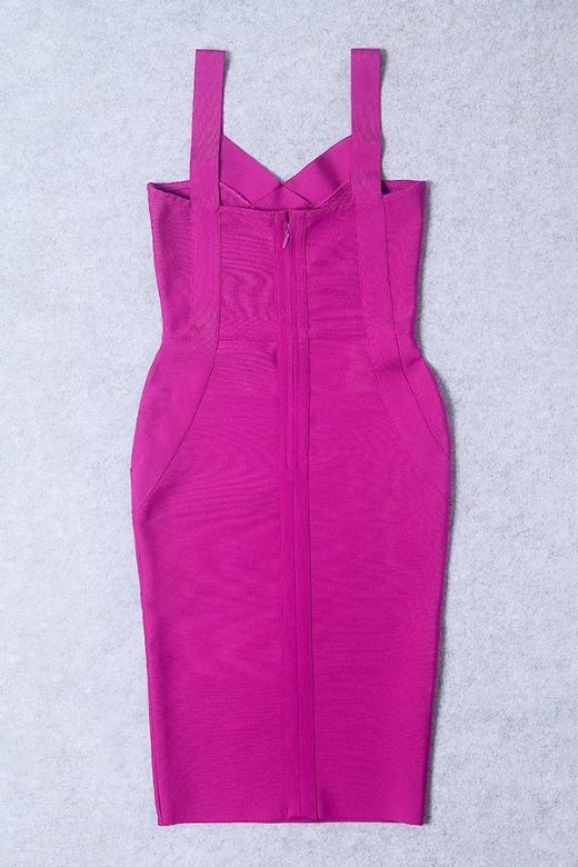 Woman wearing a figure flattering  Freya Bandage Dress - Magenta Pink BODYCON COLLECTION