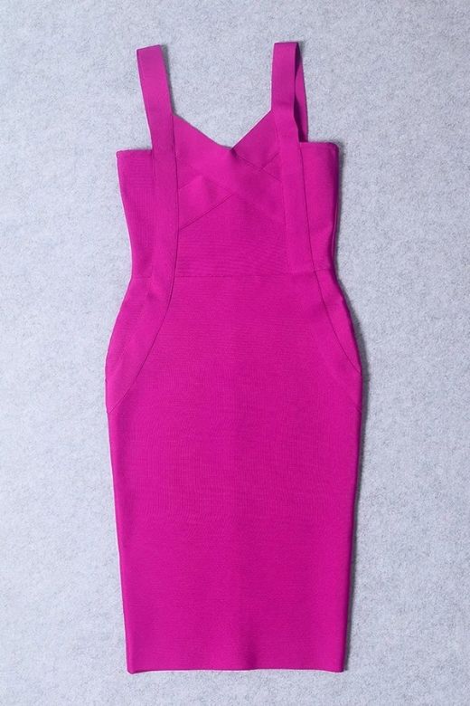 Woman wearing a figure flattering  Freya Bandage Dress - Magenta Pink BODYCON COLLECTION