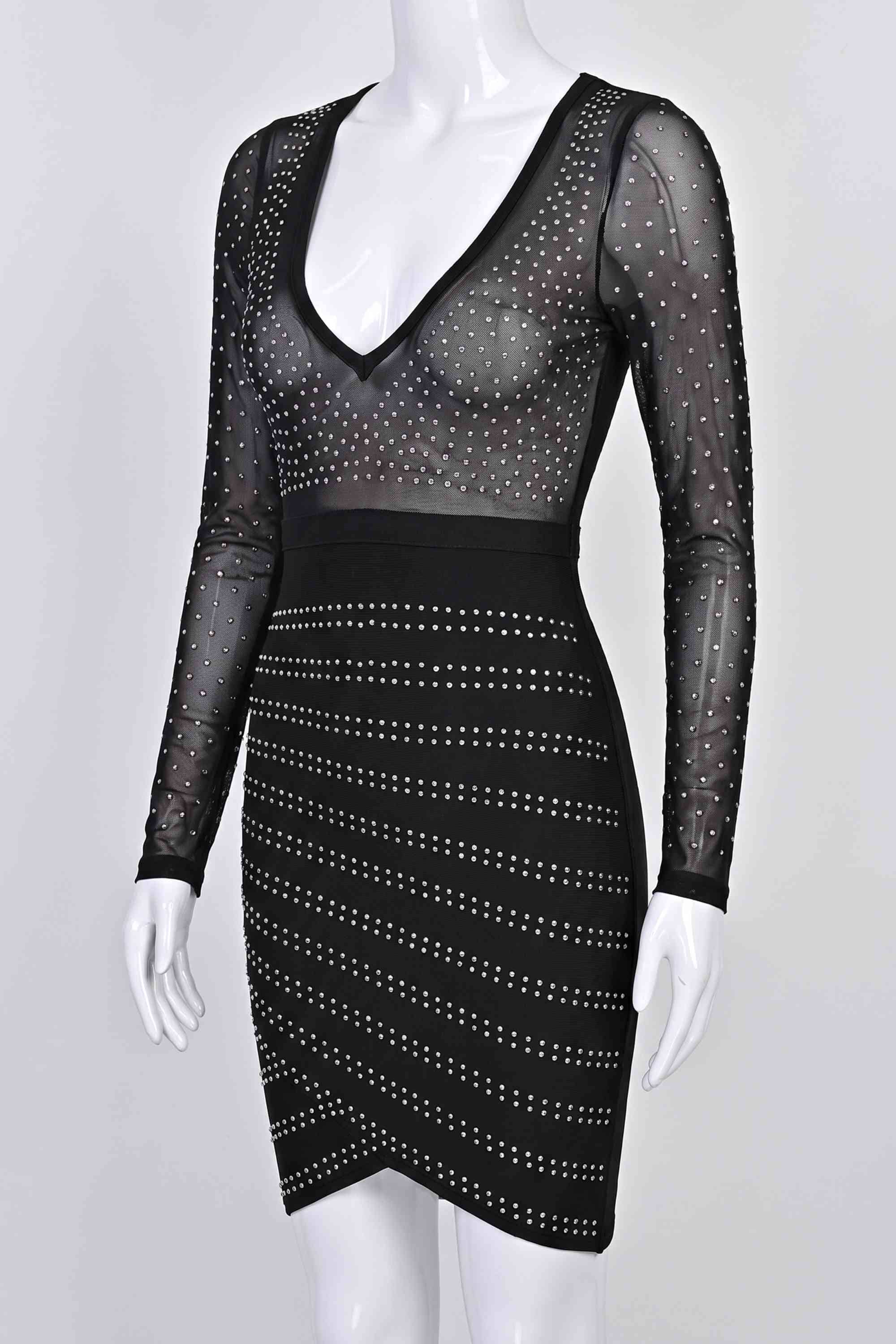 Woman wearing a figure flattering  Halle Long Sleeve Bodycon Mini Dress - Classic Black BODYCON COLLECTION Pty Ltd