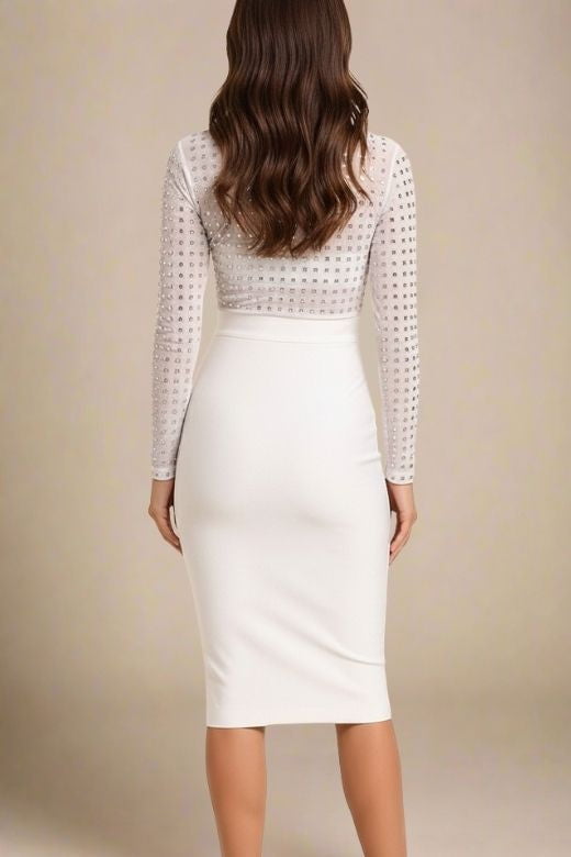 Woman wearing a figure flattering  Hazel Long Sleeve Bodycon Dress - White Pearl BODYCON COLLECTION Pty Ltd