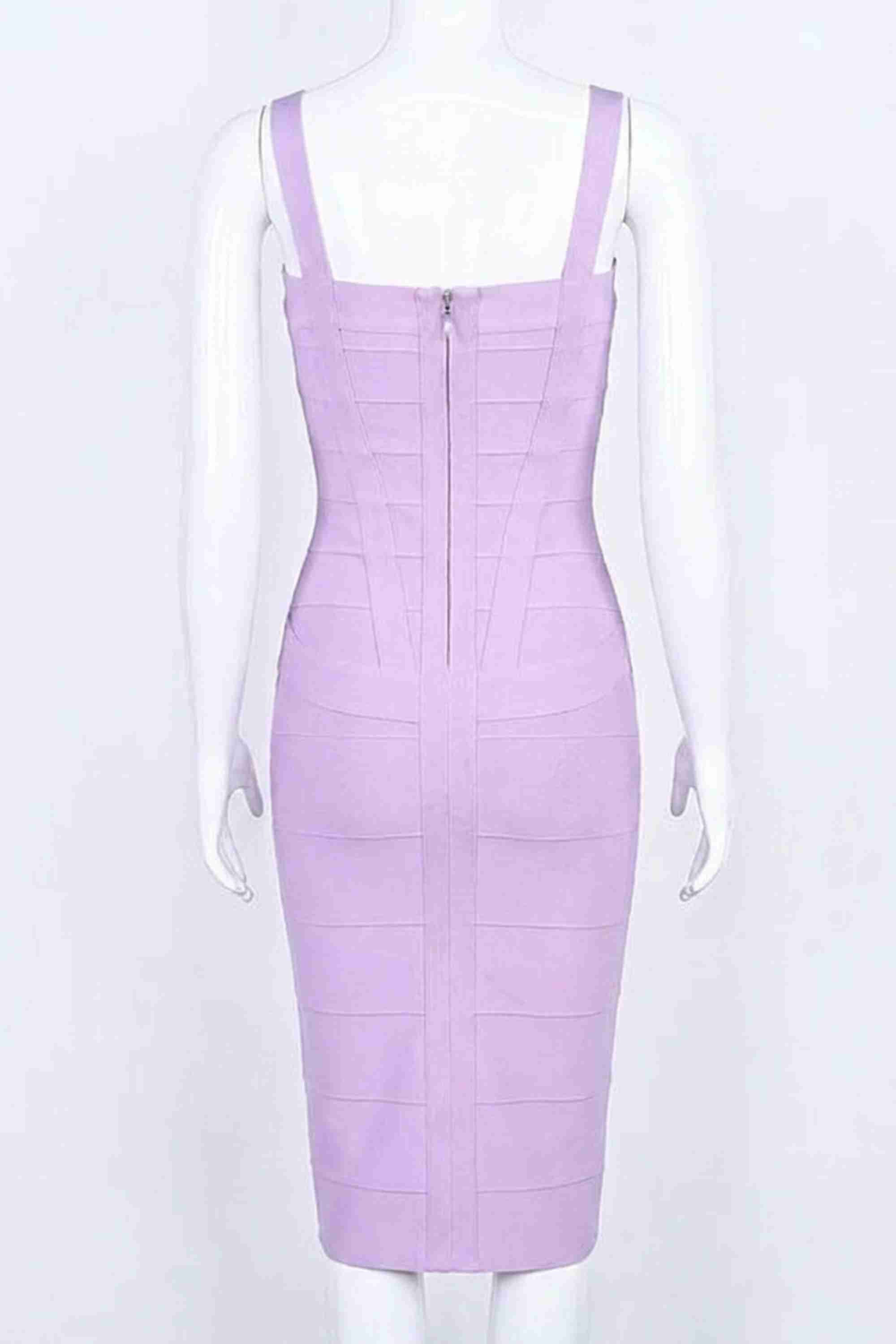Woman wearing a figure flattering  Heidi Bandage Midi Dress - Violet Bodycon Collection