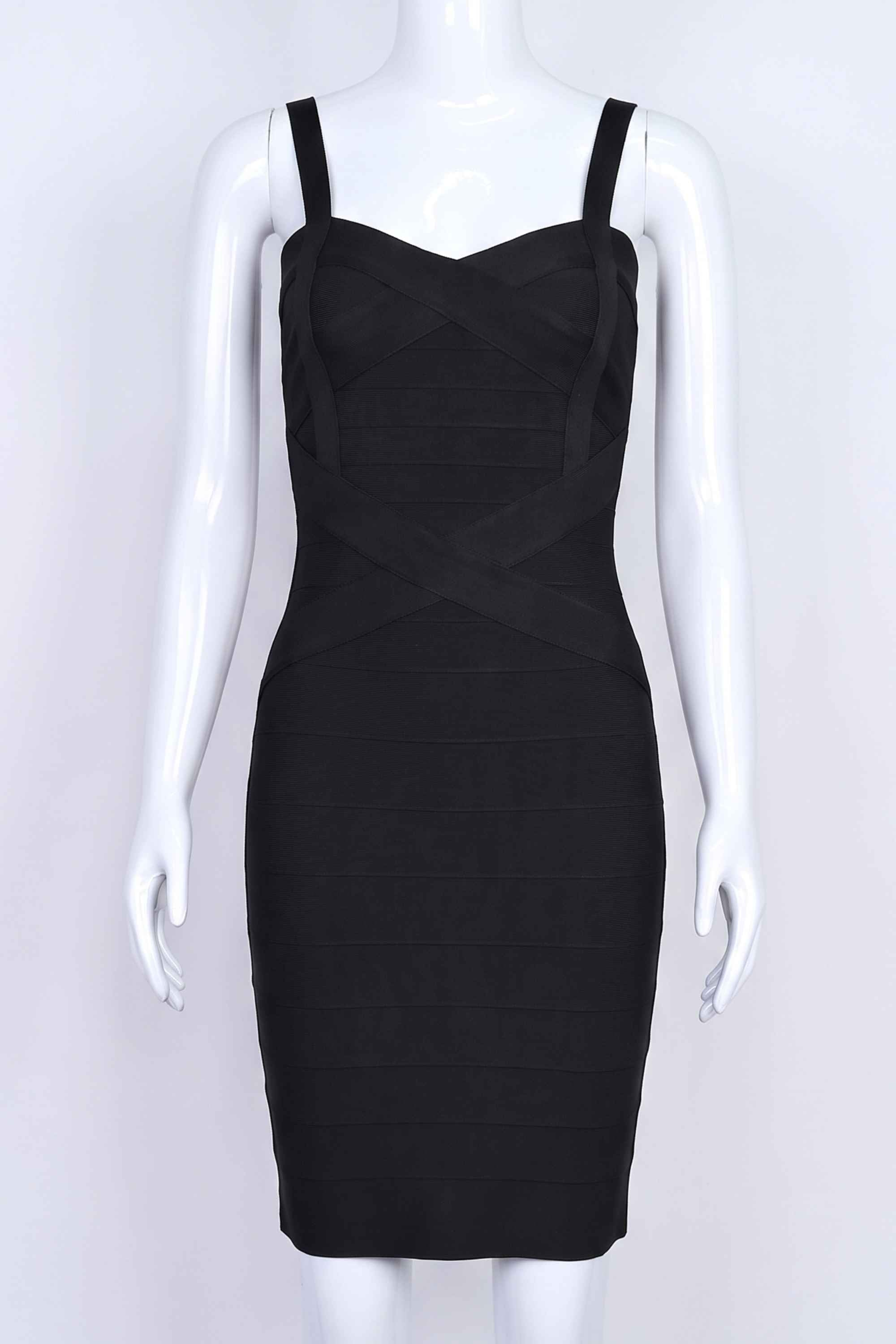 Woman wearing a figure flattering  Heidi Bandage Mini Dress - Classic Black Bodycon Collection