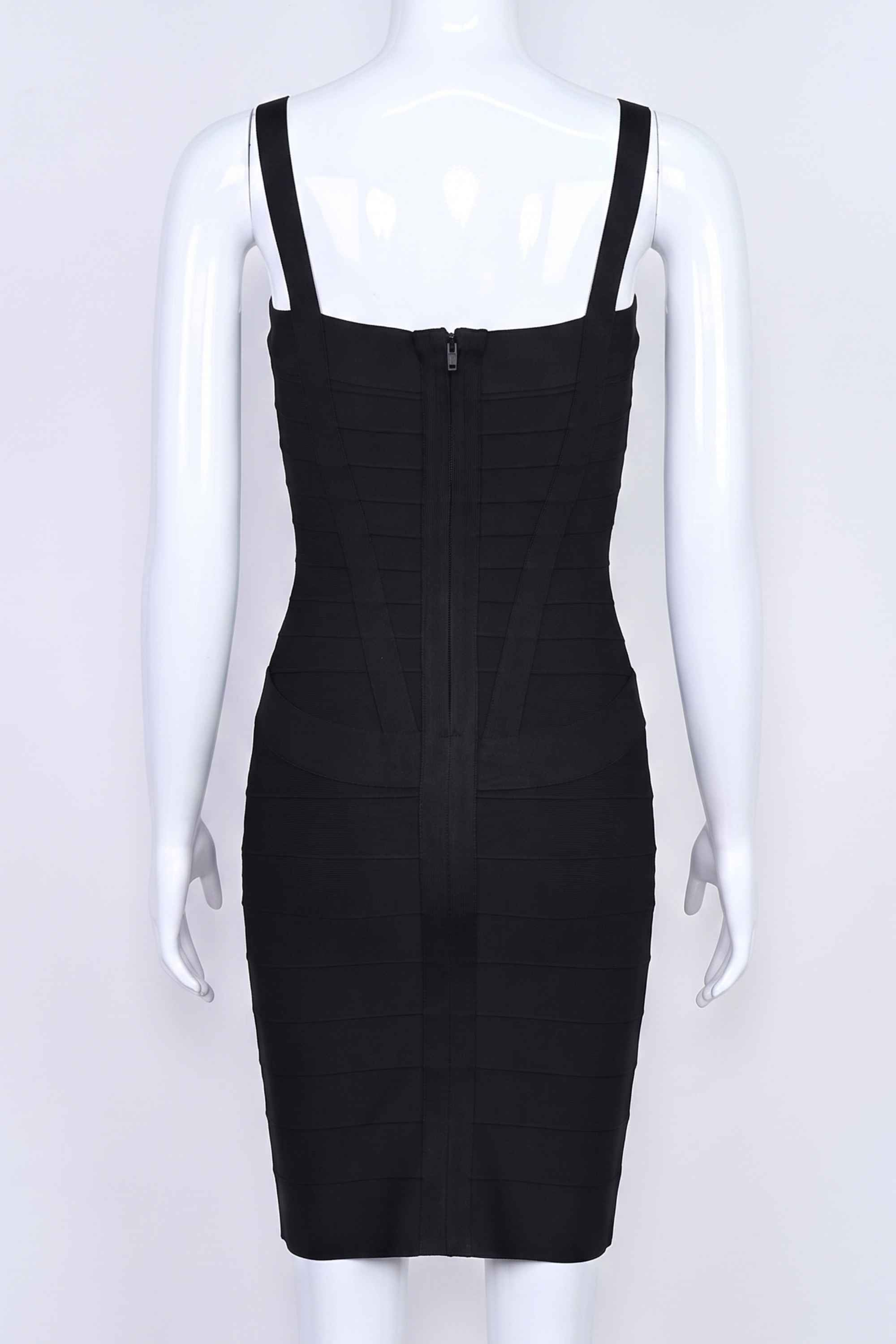 Woman wearing a figure flattering  Heidi Bandage Mini Dress - Classic Black Bodycon Collection