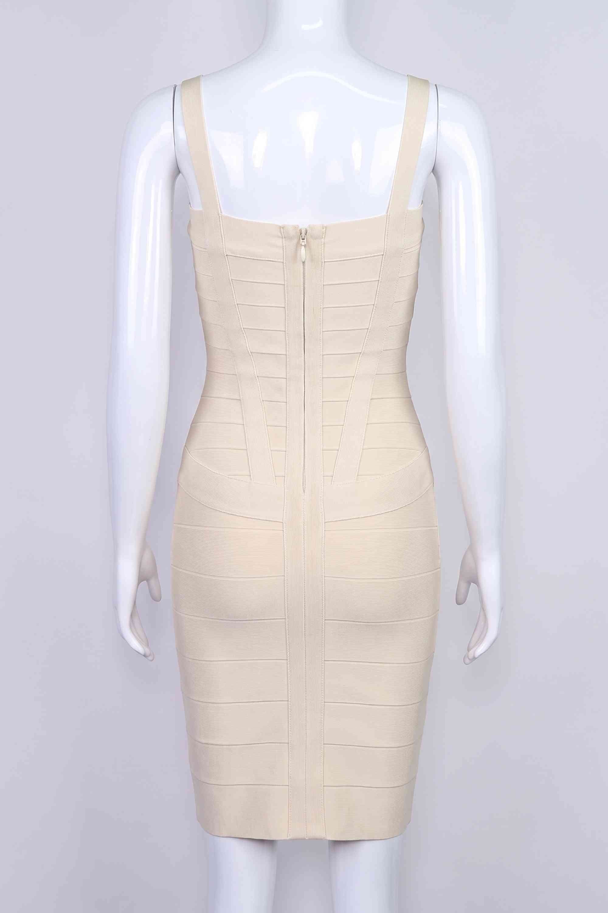 Woman wearing a figure flattering  Heidi Bandage Mini Dress - Cream Bodycon Collection