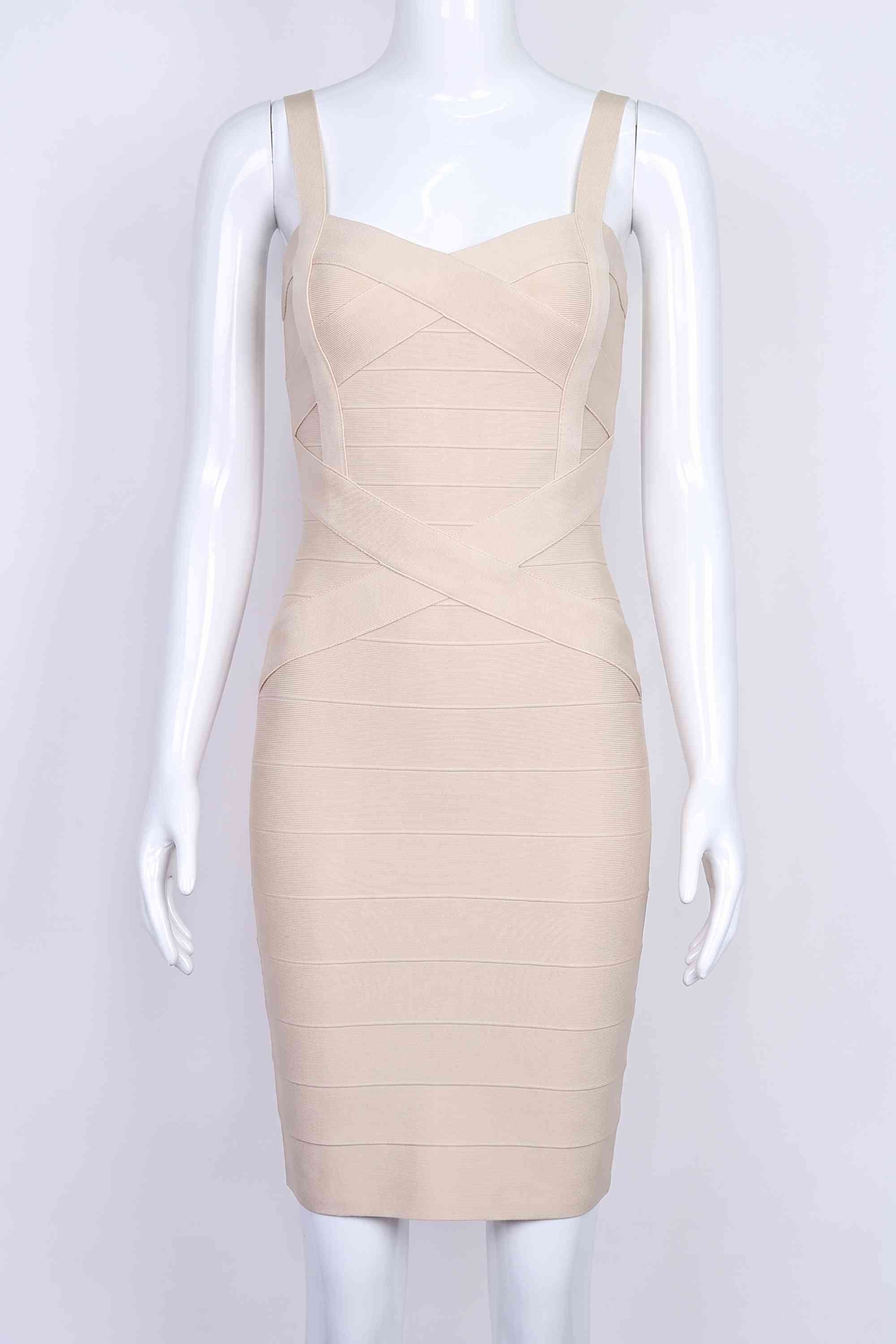 Woman wearing a figure flattering  Heidi Bandage Mini Dress - Cream Bodycon Collection