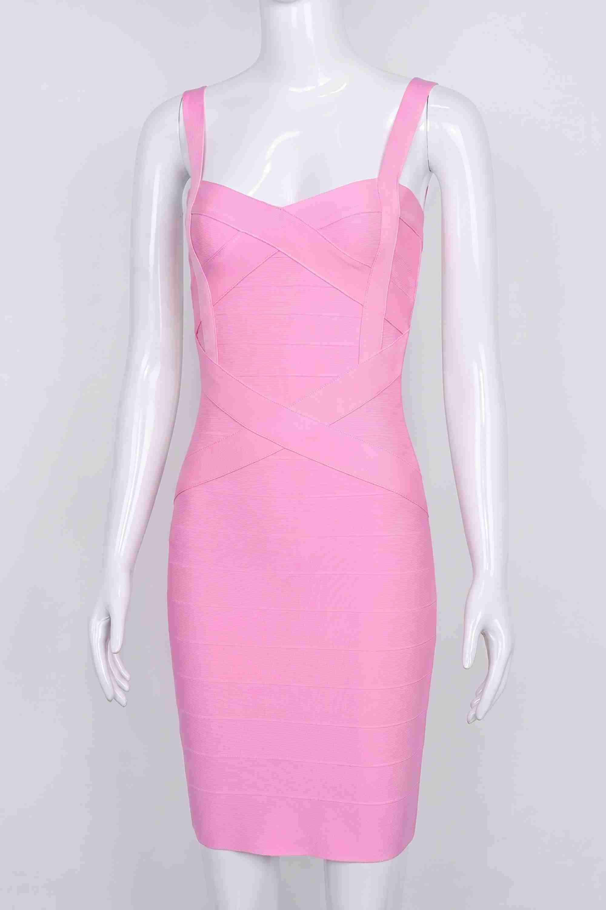 Woman wearing a figure flattering  Heidi Bandage Mini Dress - Dusty Pink Bodycon Collection