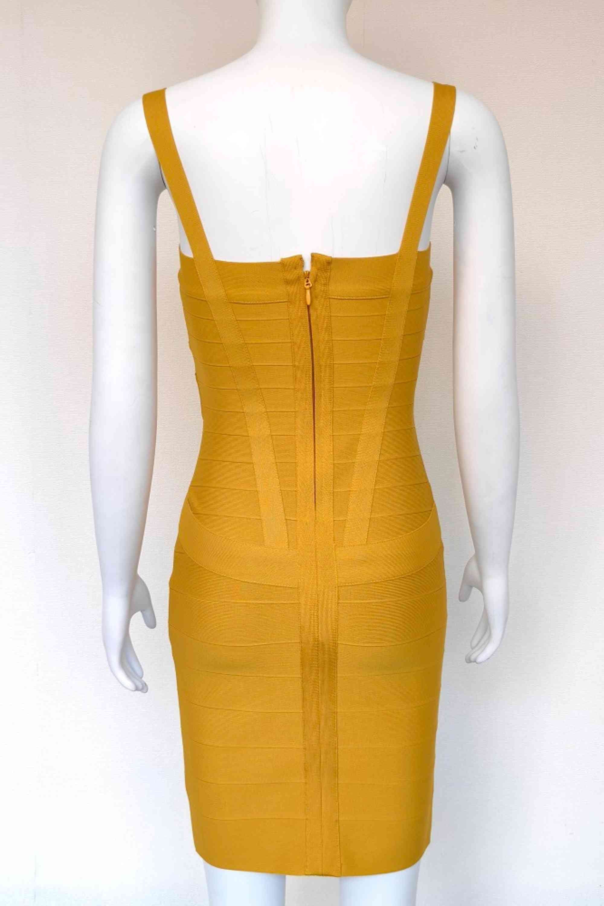 Woman wearing a figure flattering  Heidi Bandage Mini Dress - Mustard Yellow Bodycon Collection