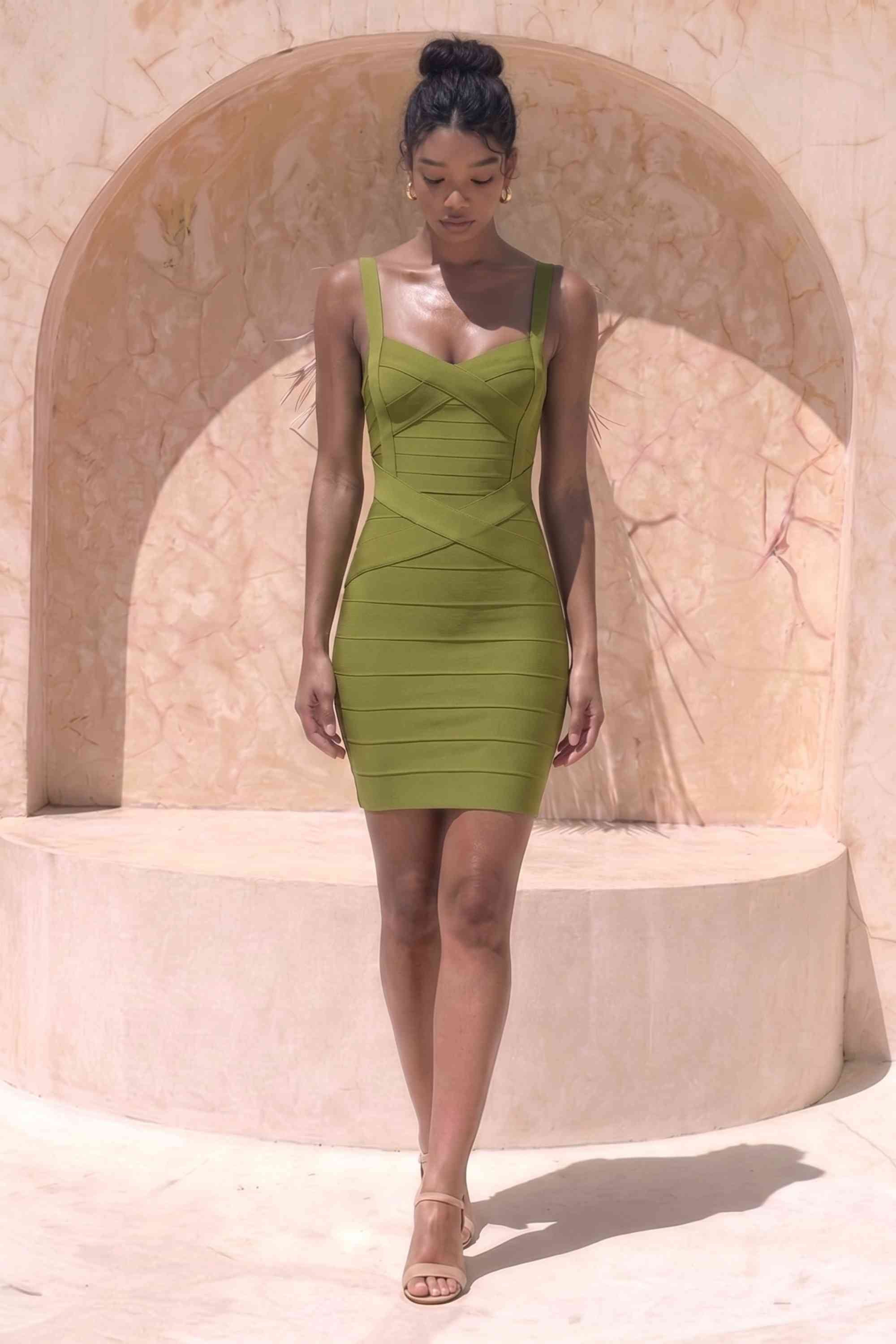 Woman wearing a figure flattering  Heidi Bandage Mini Dress - Olive Green Bodycon Collection