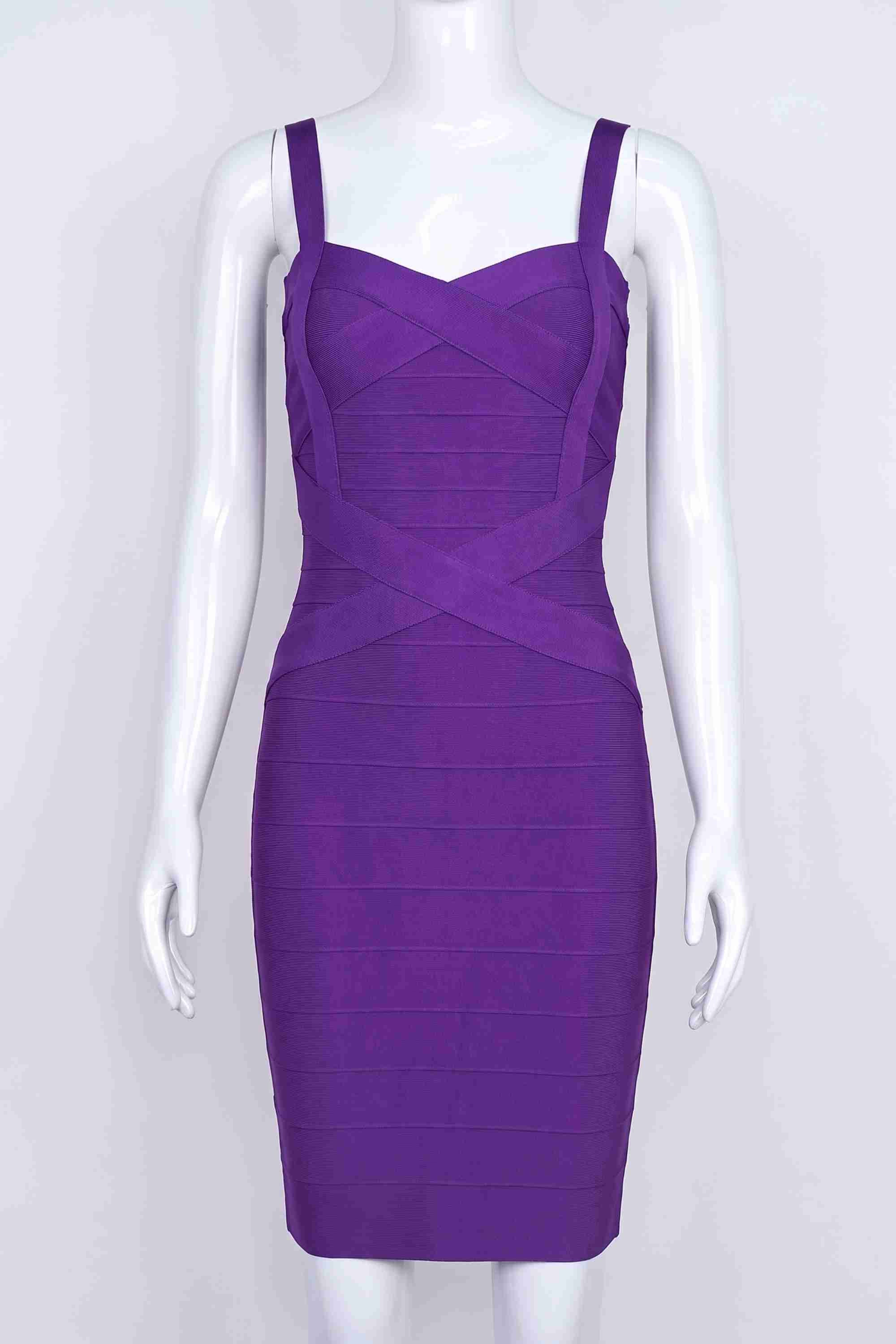 Woman wearing a figure flattering  Heidi Bandage Mini Dress - Plum Purple Bodycon Collection