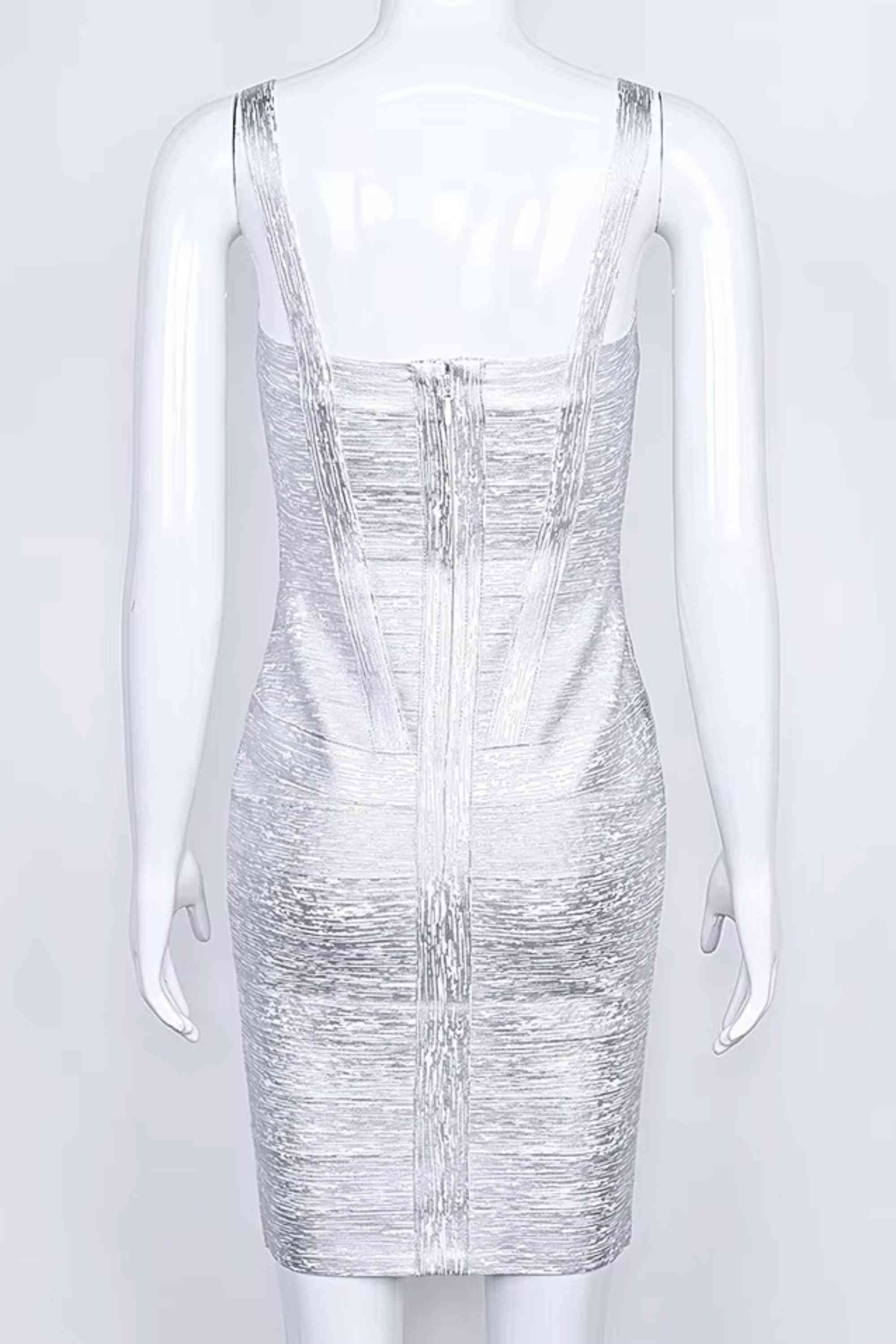 Woman wearing a figure flattering  Heidi Bandage Mini Dress - Silver Bodycon Collection