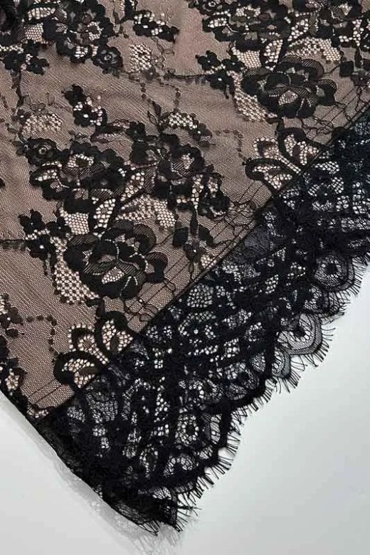 Woman wearing a figure flattering  Joan Bodycon Dress - Classic Black BODYCON COLLECTION