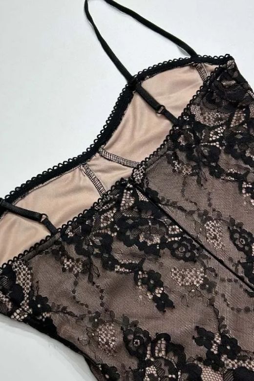 Woman wearing a figure flattering  Joan Bodycon Dress - Classic Black BODYCON COLLECTION