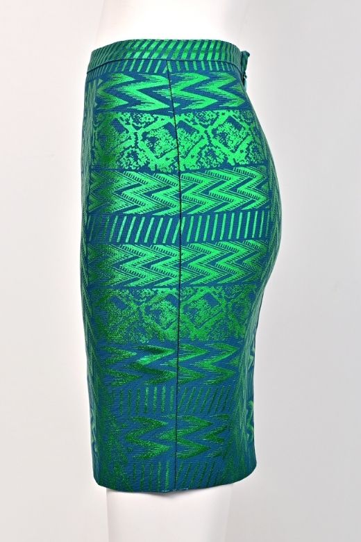Woman wearing a figure flattering  High Waist Metallic Leather Mini Skirt - Emerald Green BODYCON COLLECTION