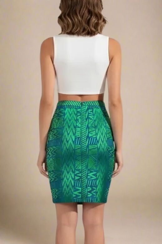 Woman wearing a figure flattering  High Waist Metallic Leather Mini Skirt - Emerald Green BODYCON COLLECTION