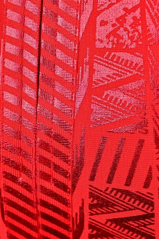 Woman wearing a figure flattering  High Waist Metallic Leather Mini Skirt - Lipstick Red BODYCON COLLECTION