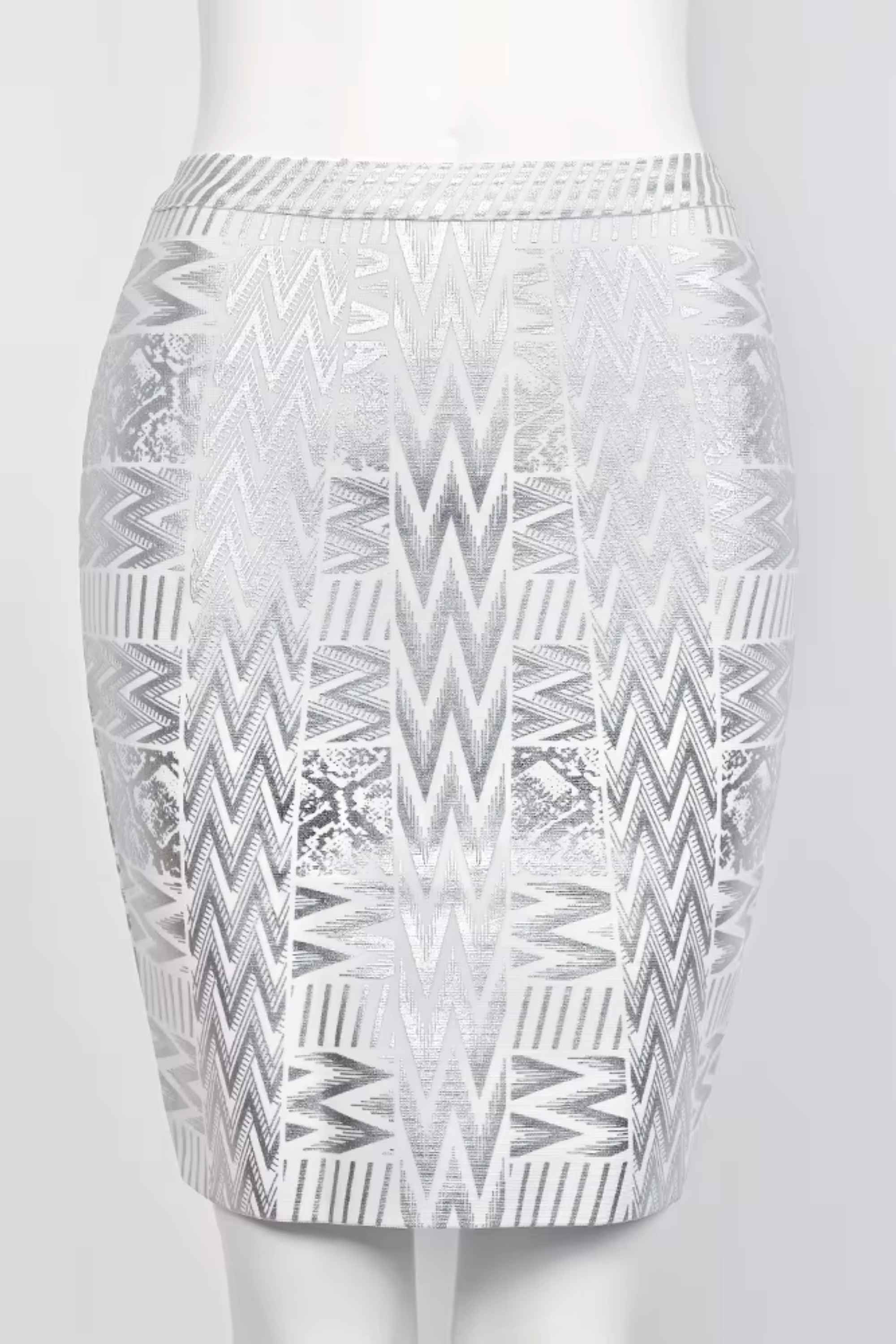 Woman wearing a figure flattering  High Waist Metallic Leather Mini Skirt - Silver BODYCON COLLECTION