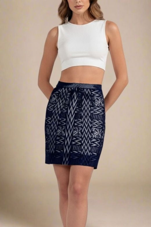 Woman wearing a figure flattering  High Waist Metallic Mini Skirt - Classic Black BODYCON COLLECTION