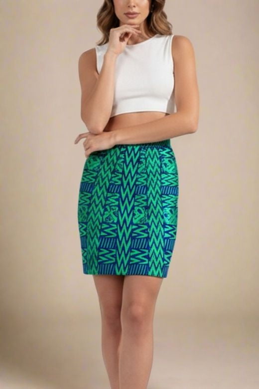 Woman wearing a figure flattering  High Waist Metallic Mini Skirt - Emerald Green BODYCON COLLECTION
