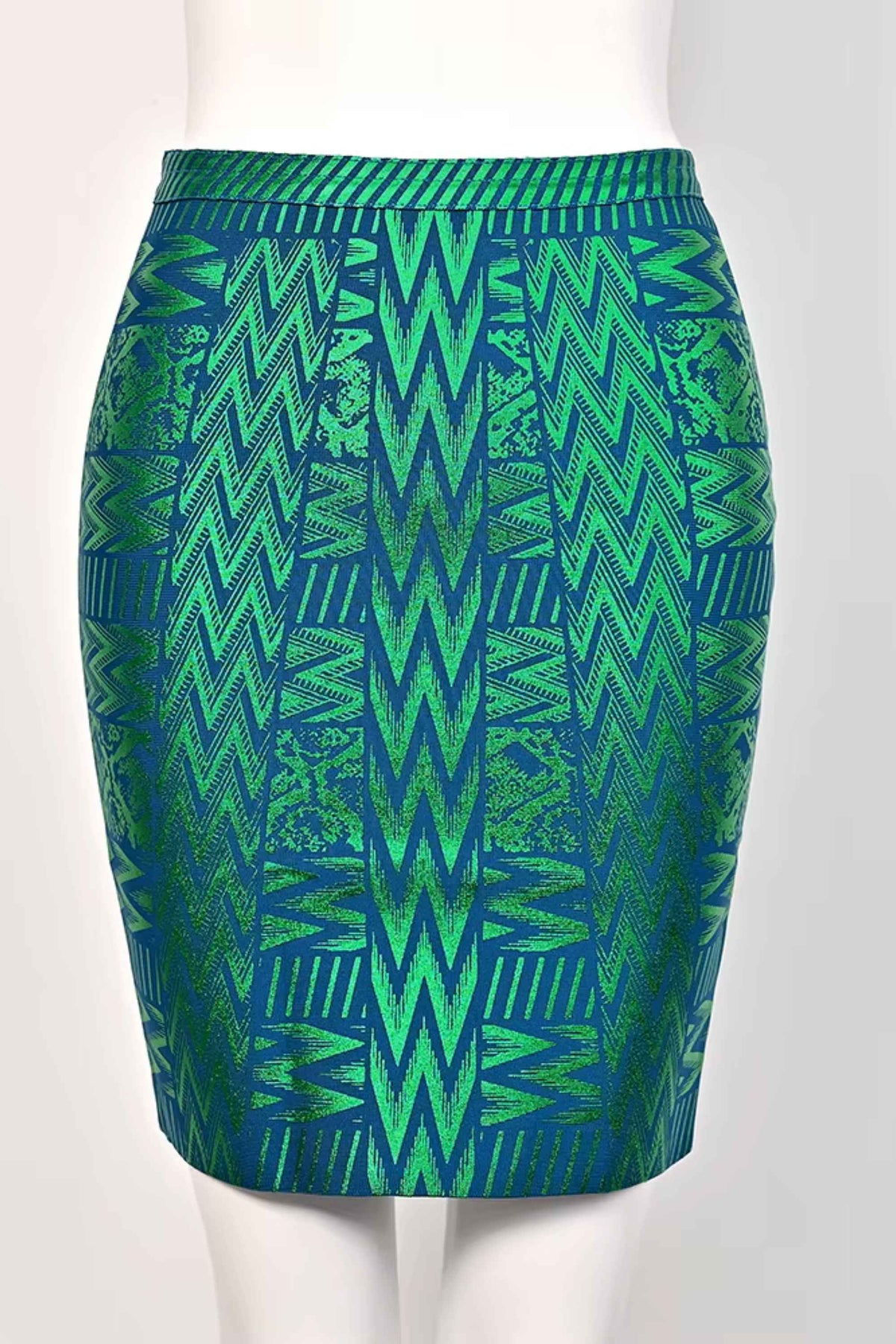 Woman wearing a figure flattering  High Waist Metallic Mini Skirt - Emerald Green BODYCON COLLECTION