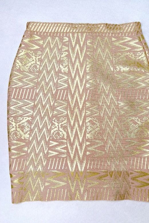 Woman wearing a figure flattering  High Waist Metallic Mini Skirt - Gold BODYCON COLLECTION