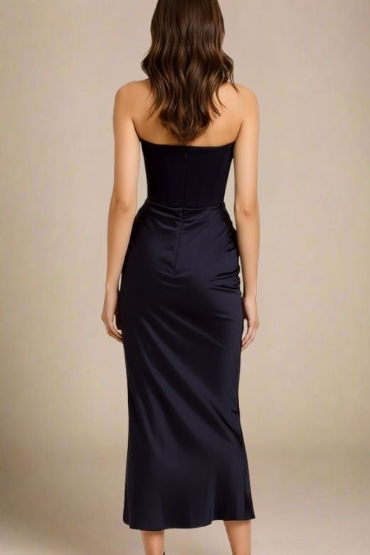 Woman wearing a figure flattering  Hope Bodycon Wrap Maxi Dress - Classic Black BODYCON COLLECTION