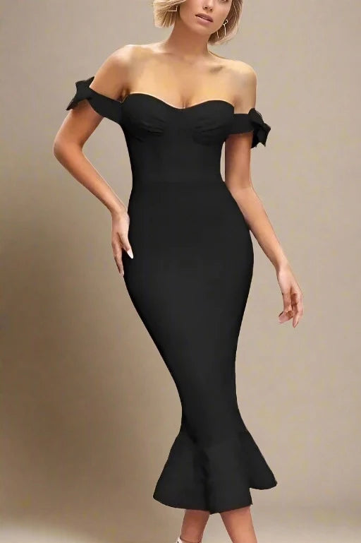 Woman wearing a figure flattering  Hunter Bandage Midi Dress - Classic Black BODYCON COLLECTION