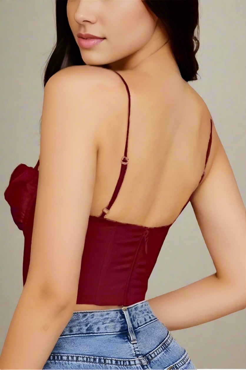 Woman wearing a figure flattering  Indi Corset Crop Top - Red Wine BODYCON COLLECTION